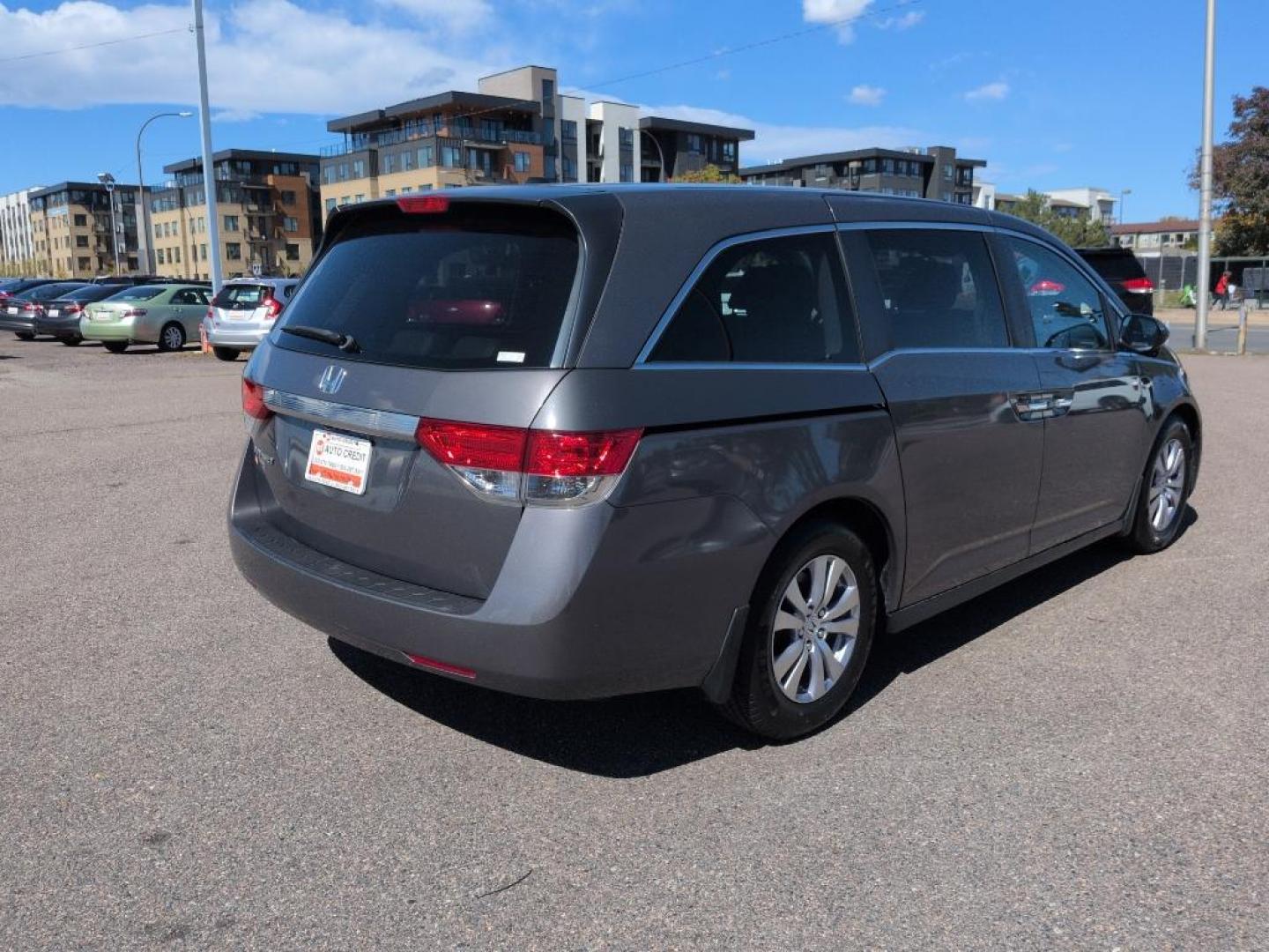 2014 GRAY Honda Odyssey EX-L (5FNRL5H65EB) with an V6, 3.5L engine, Automatic transmission, located at 10890 W. Colfax Ave., Lakewood, CO, 80215, (303) 274-7692, 39.739914, -105.120132 - Photo#4
