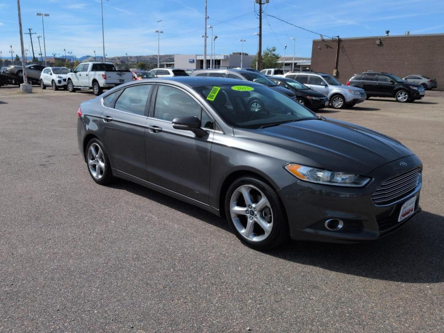 2015 GRAY Ford Fusion SE (1FA6P0H78F5) with an 4 Cyl, 2.5L engine, Automatic transmission, located at 10890 W. Colfax Ave., Lakewood, CO, 80215, (303) 274-7692, 39.739914, -105.120132 - Photo#2