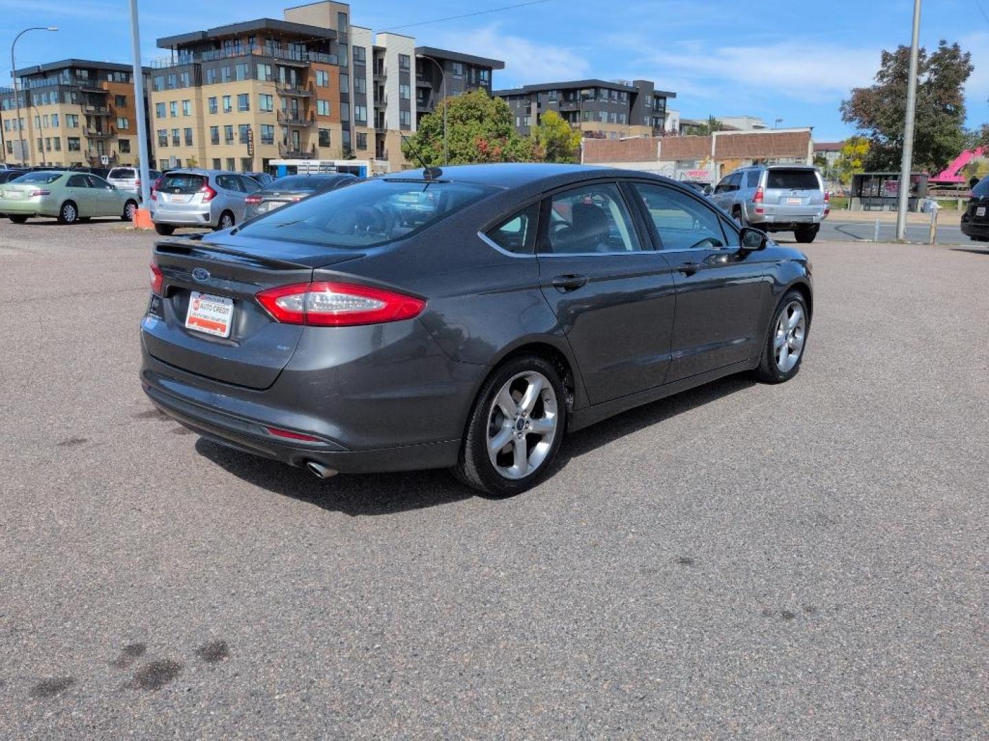 2015 GRAY Ford Fusion SE (1FA6P0H78F5) with an 4 Cyl, 2.5L engine, Automatic transmission, located at 10890 W. Colfax Ave., Lakewood, CO, 80215, (303) 274-7692, 39.739914, -105.120132 - Photo#4