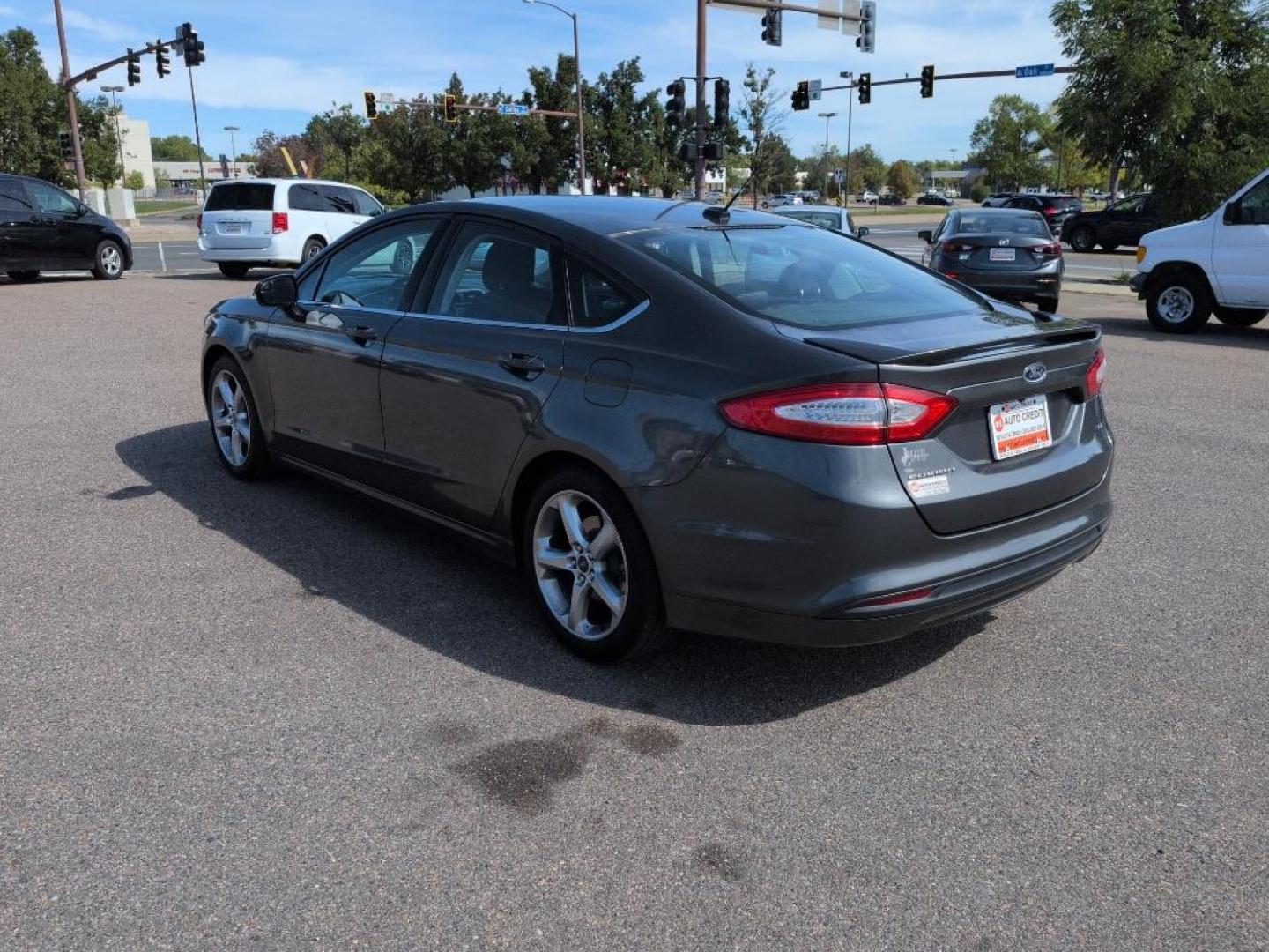 2015 GRAY Ford Fusion SE (1FA6P0H78F5) with an 4 Cyl, 2.5L engine, Automatic transmission, located at 10890 W. Colfax Ave., Lakewood, CO, 80215, (303) 274-7692, 39.739914, -105.120132 - Photo#6