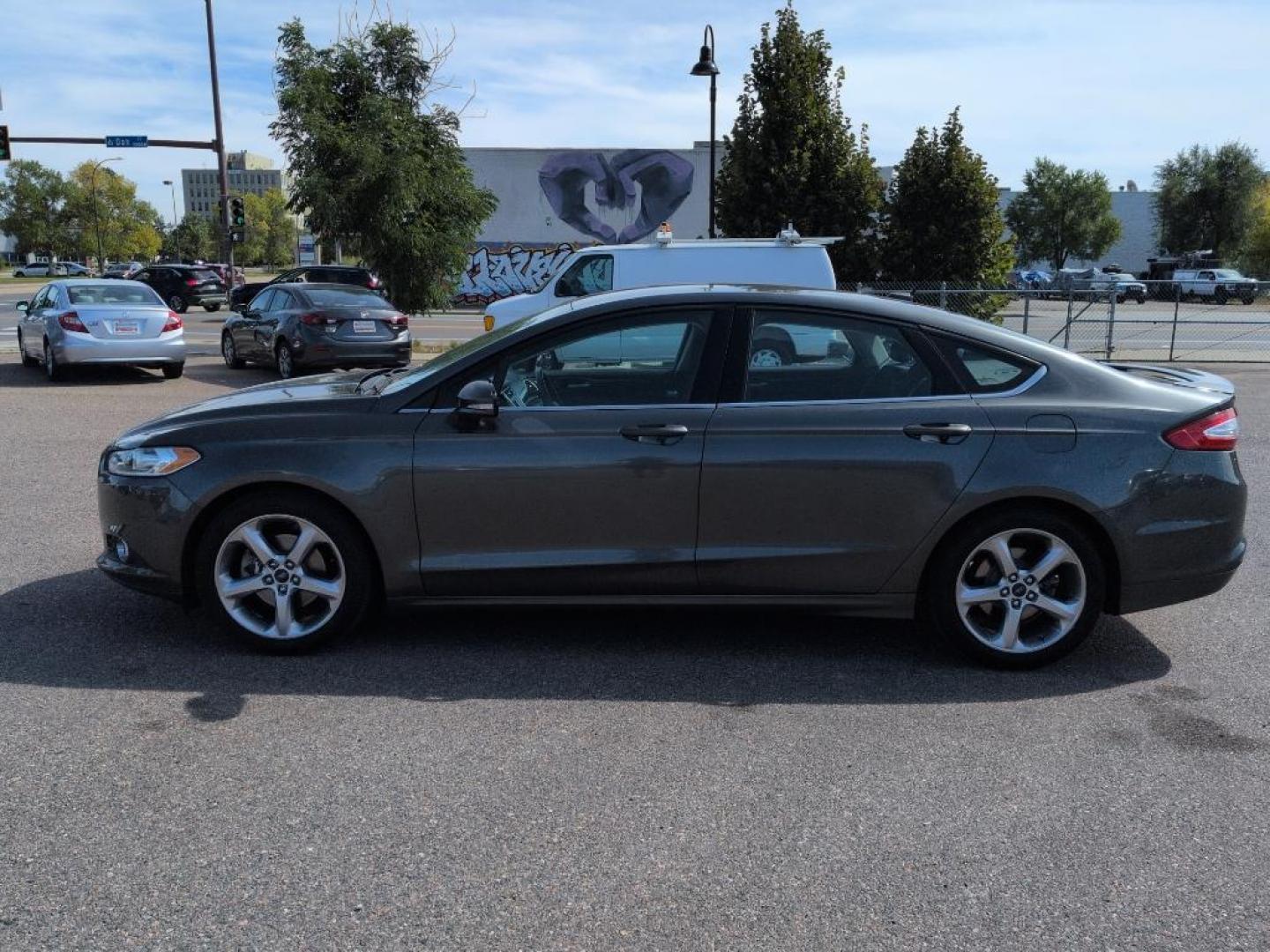 2015 GRAY Ford Fusion SE (1FA6P0H78F5) with an 4 Cyl, 2.5L engine, Automatic transmission, located at 10890 W. Colfax Ave., Lakewood, CO, 80215, (303) 274-7692, 39.739914, -105.120132 - Photo#7