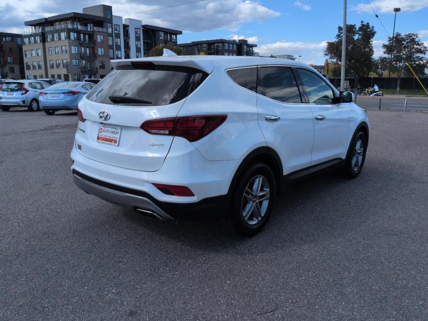 2017 WHITE Hyundai Santa Fe Sport Base (5XYZT3LB8HG) with an 4 Cyl, 2.4L engine, Automatic transmission, located at 10890 W. Colfax Ave., Lakewood, CO, 80215, (303) 274-7692, 39.739914, -105.120132 - Photo#4