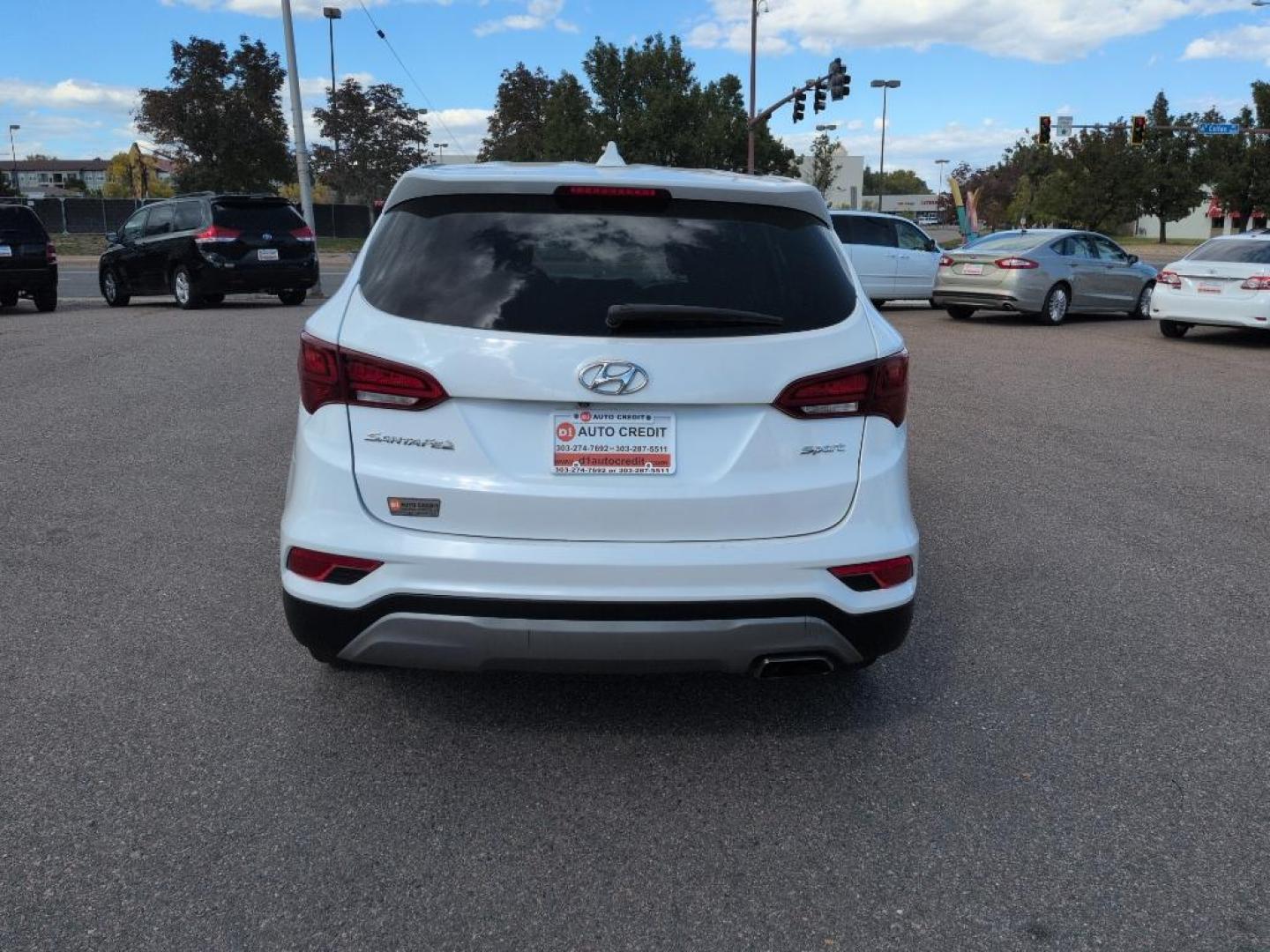2017 WHITE Hyundai Santa Fe Sport Base (5XYZT3LB8HG) with an 4 Cyl, 2.4L engine, Automatic transmission, located at 10890 W. Colfax Ave., Lakewood, CO, 80215, (303) 274-7692, 39.739914, -105.120132 - Photo#5