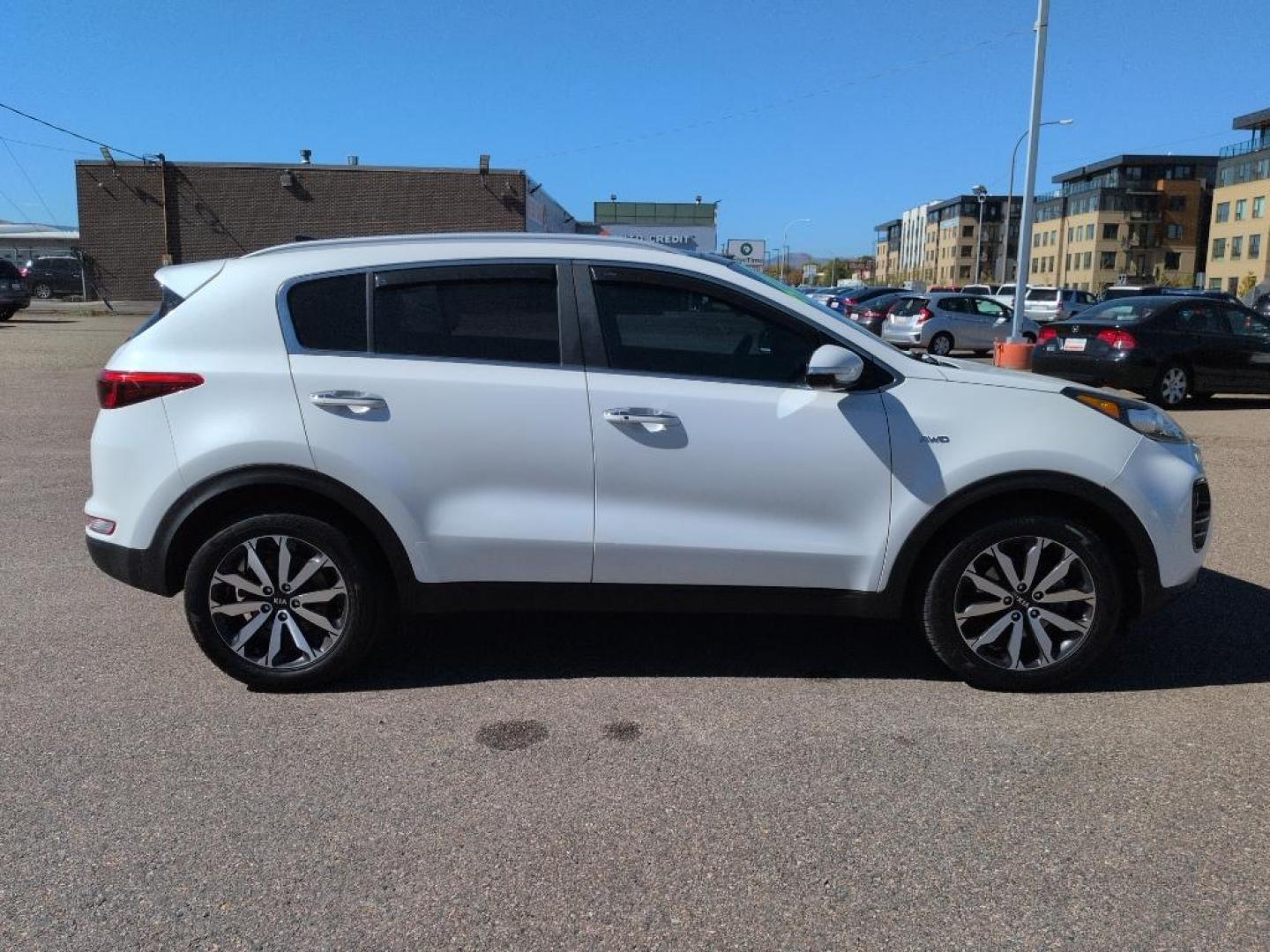 2017 WHITE Kia Sportage EX (KNDPNCAC1H7) with an 4 Cyl, 2.4L engine, Automatic transmission, located at 10890 W. Colfax Ave., Lakewood, CO, 80215, (303) 274-7692, 39.739914, -105.120132 - Photo#3