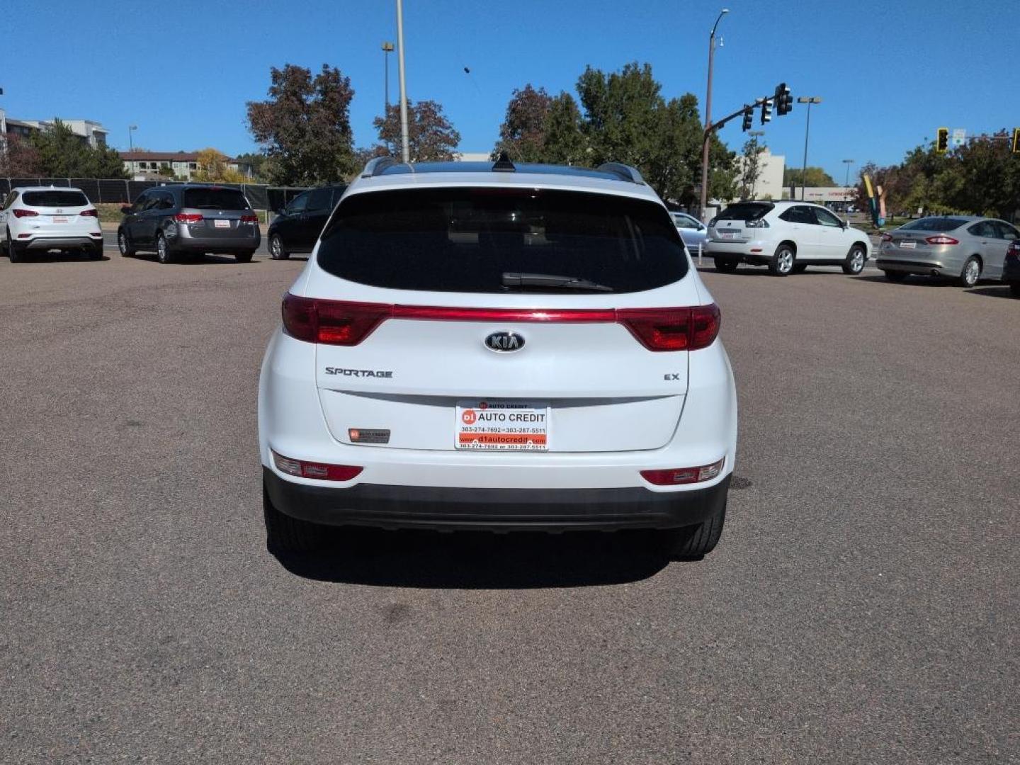 2017 WHITE Kia Sportage EX (KNDPNCAC1H7) with an 4 Cyl, 2.4L engine, Automatic transmission, located at 10890 W. Colfax Ave., Lakewood, CO, 80215, (303) 274-7692, 39.739914, -105.120132 - Photo#5