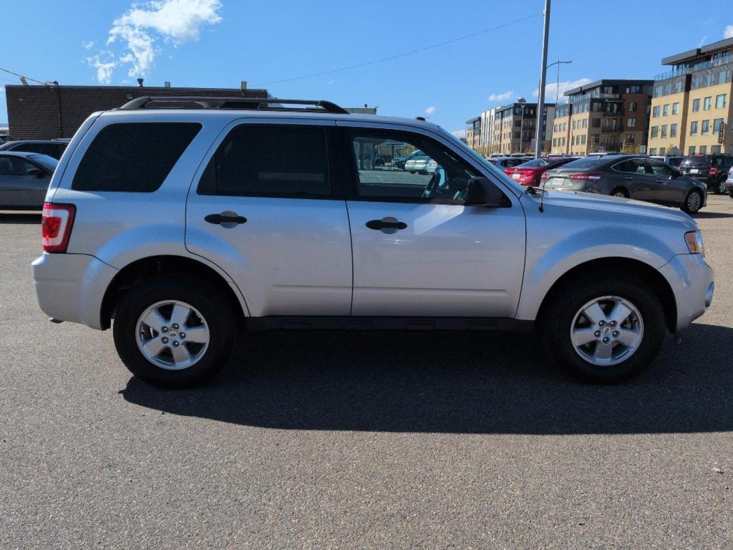 2010 SILVER Ford Escape XLT (1FMCU9D71AK) with an 4 Cyl, 2.5L engine, Automatic transmission, located at 10890 W. Colfax Ave., Lakewood, CO, 80215, (303) 274-7692, 39.739914, -105.120132 - Photo#3