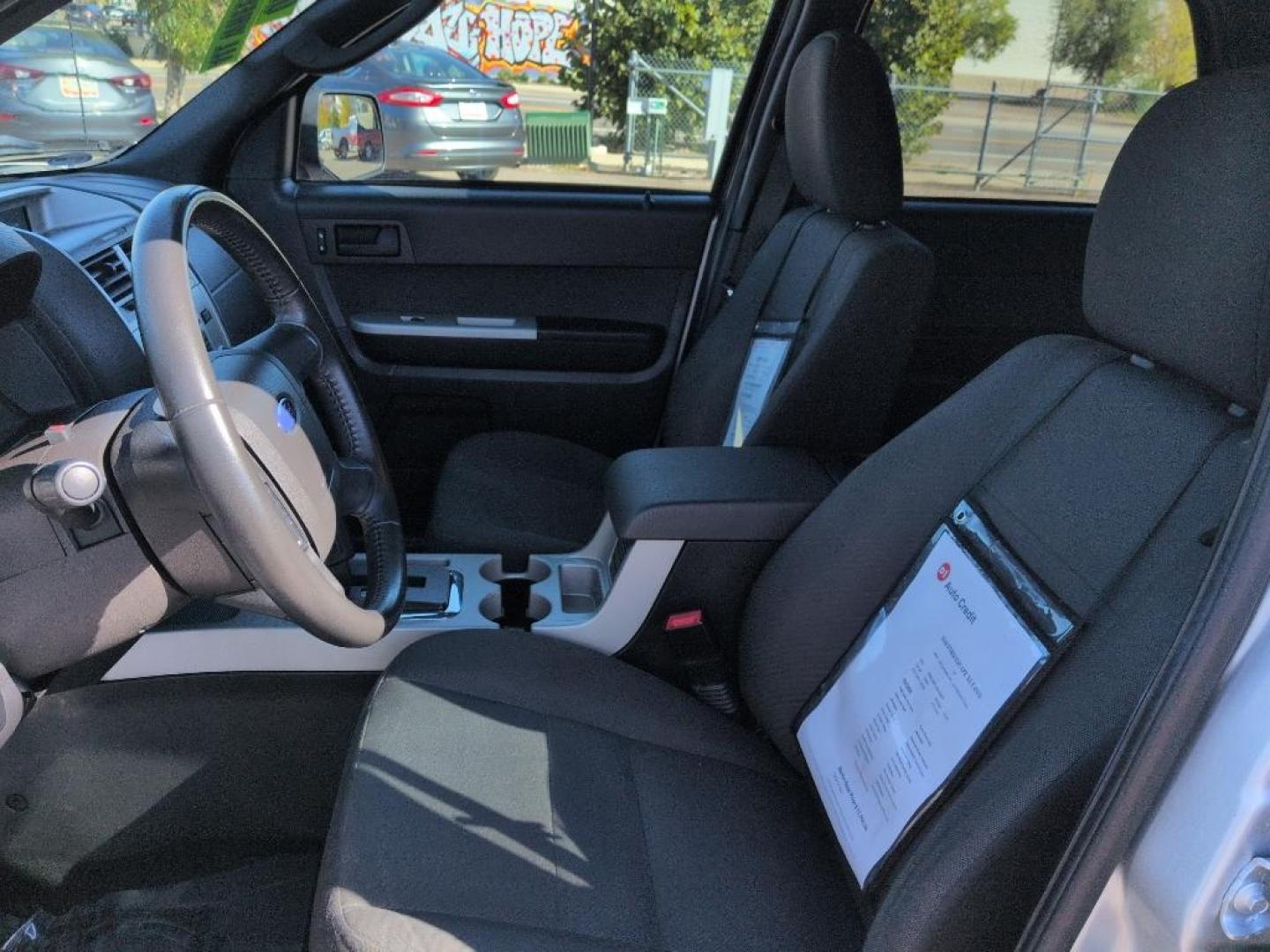 2010 SILVER Ford Escape XLT (1FMCU9D71AK) with an 4 Cyl, 2.5L engine, Automatic transmission, located at 10890 W. Colfax Ave., Lakewood, CO, 80215, (303) 274-7692, 39.739914, -105.120132 - Photo#9