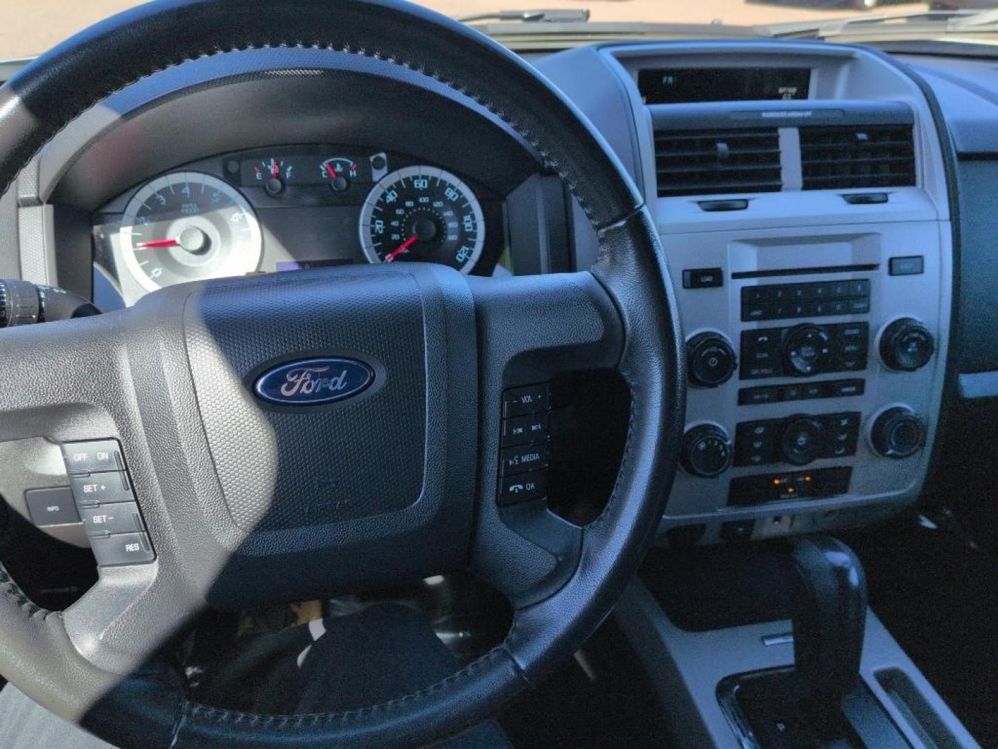 2010 SILVER Ford Escape XLT (1FMCU9D71AK) with an 4 Cyl, 2.5L engine, Automatic transmission, located at 10890 W. Colfax Ave., Lakewood, CO, 80215, (303) 274-7692, 39.739914, -105.120132 - Photo#10