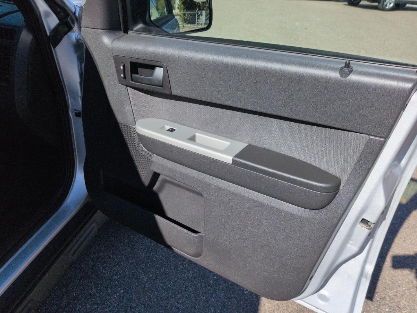 2010 SILVER Ford Escape XLT (1FMCU9D71AK) with an 4 Cyl, 2.5L engine, Automatic transmission, located at 10890 W. Colfax Ave., Lakewood, CO, 80215, (303) 274-7692, 39.739914, -105.120132 - Photo#16