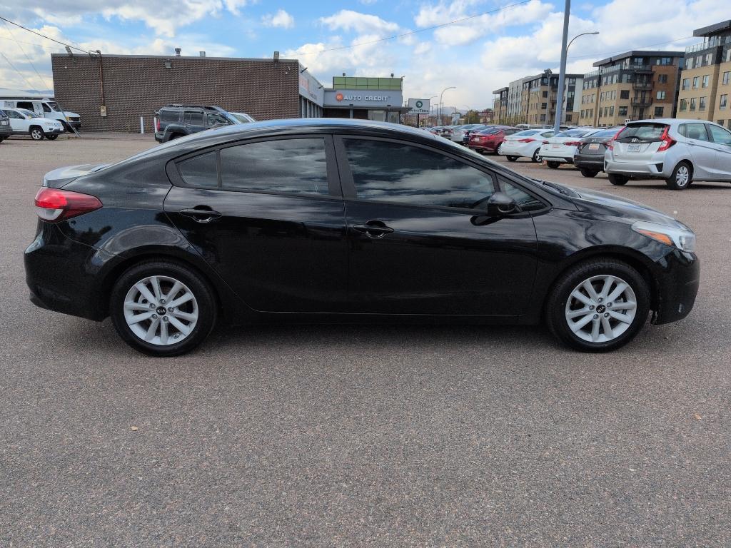2017 BLACK Kia Forte LX 6A (3KPFL4A79HE) with an 4 Cyl, 2.0L engine, Automatic transmission, located at 10890 W. Colfax Ave., Lakewood, CO, 80215, (303) 274-7692, 39.739914, -105.120132 - Photo#3