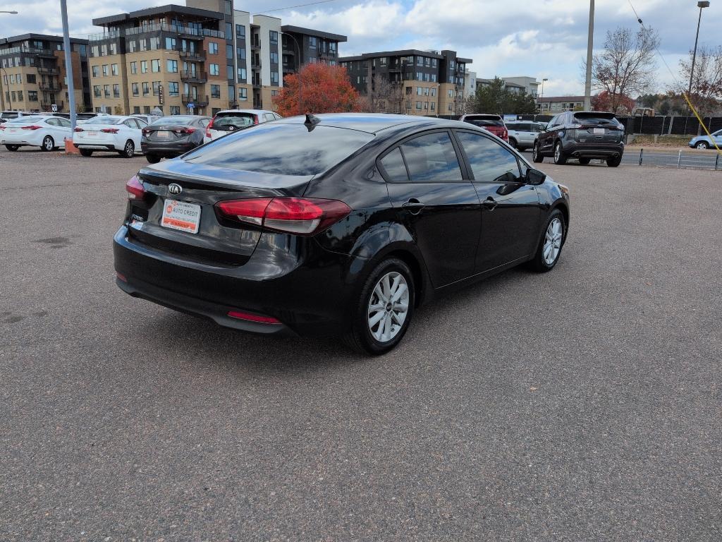 2017 BLACK Kia Forte LX 6A (3KPFL4A79HE) with an 4 Cyl, 2.0L engine, Automatic transmission, located at 10890 W. Colfax Ave., Lakewood, CO, 80215, (303) 274-7692, 39.739914, -105.120132 - Photo#4