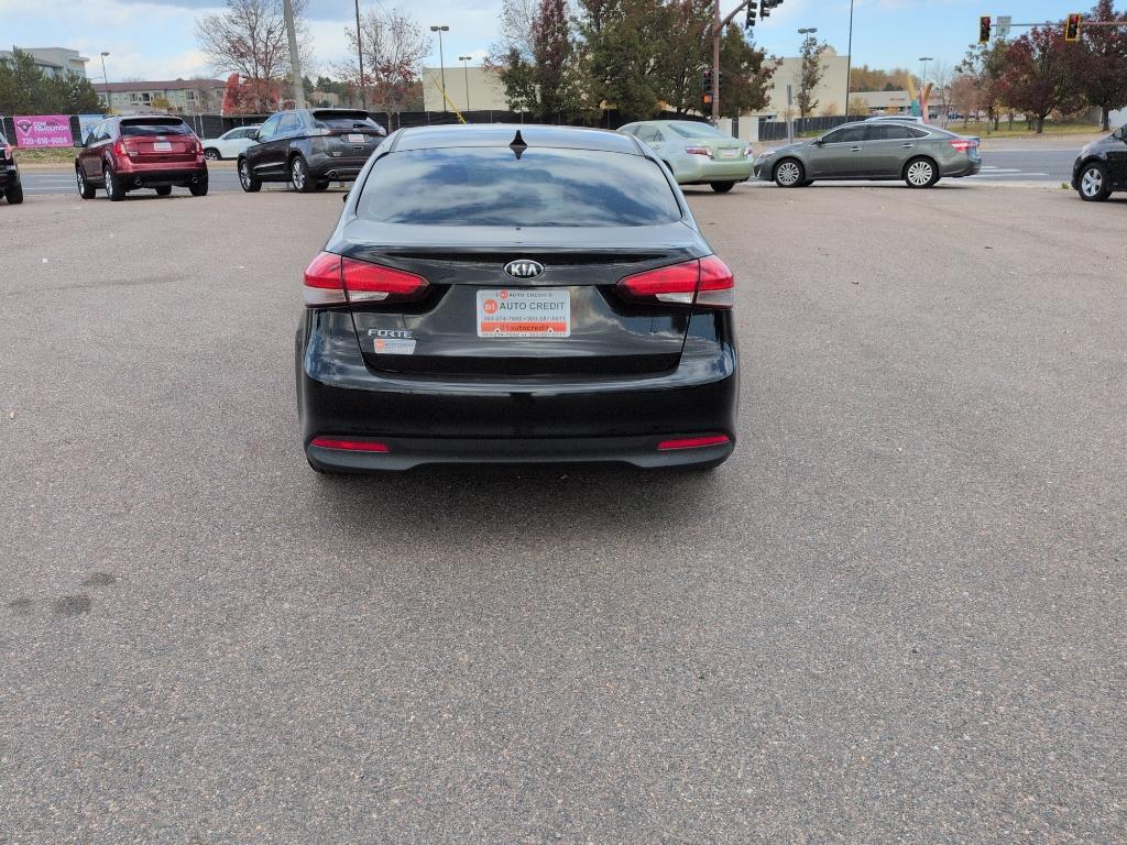 2017 BLACK Kia Forte LX 6A (3KPFL4A79HE) with an 4 Cyl, 2.0L engine, Automatic transmission, located at 10890 W. Colfax Ave., Lakewood, CO, 80215, (303) 274-7692, 39.739914, -105.120132 - Photo#5