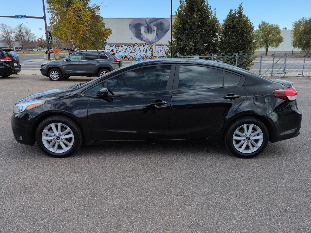 2017 BLACK Kia Forte LX 6A (3KPFL4A79HE) with an 4 Cyl, 2.0L engine, Automatic transmission, located at 10890 W. Colfax Ave., Lakewood, CO, 80215, (303) 274-7692, 39.739914, -105.120132 - Photo#7