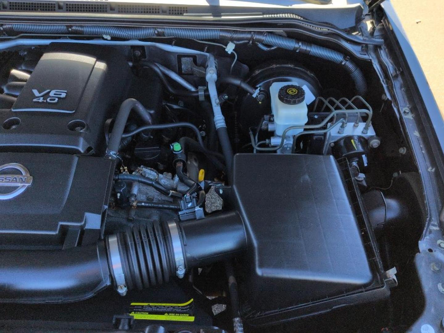 2006 GRAY Nissan Xterra OR 4WD (5N1AN08W06C) with an V6, 4.0L engine, Automatic transmission, located at 10890 W. Colfax Ave., Lakewood, CO, 80215, (303) 274-7692, 39.739914, -105.120132 - Photo#26