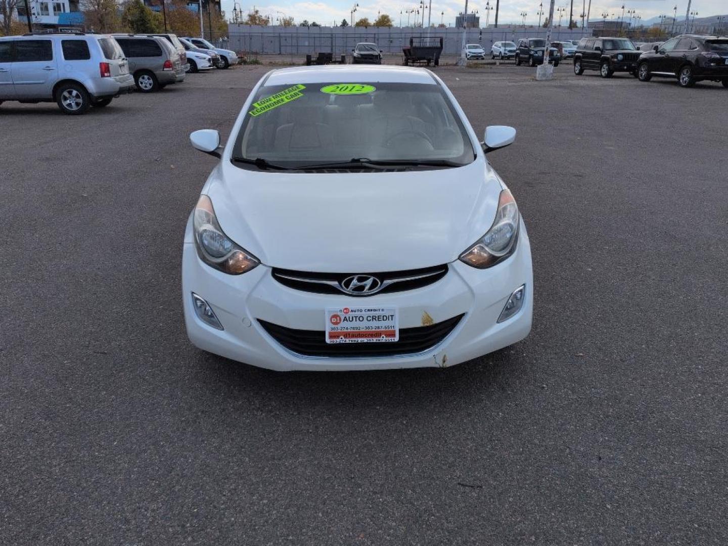 2012 WHITE Hyundai Elantra LIMITED (5NPDH4AEXCH) with an 4 Cyl, 1.8L engine, Automatic transmission, located at 10890 W. Colfax Ave., Lakewood, CO, 80215, (303) 274-7692, 39.739914, -105.120132 - Photo#1