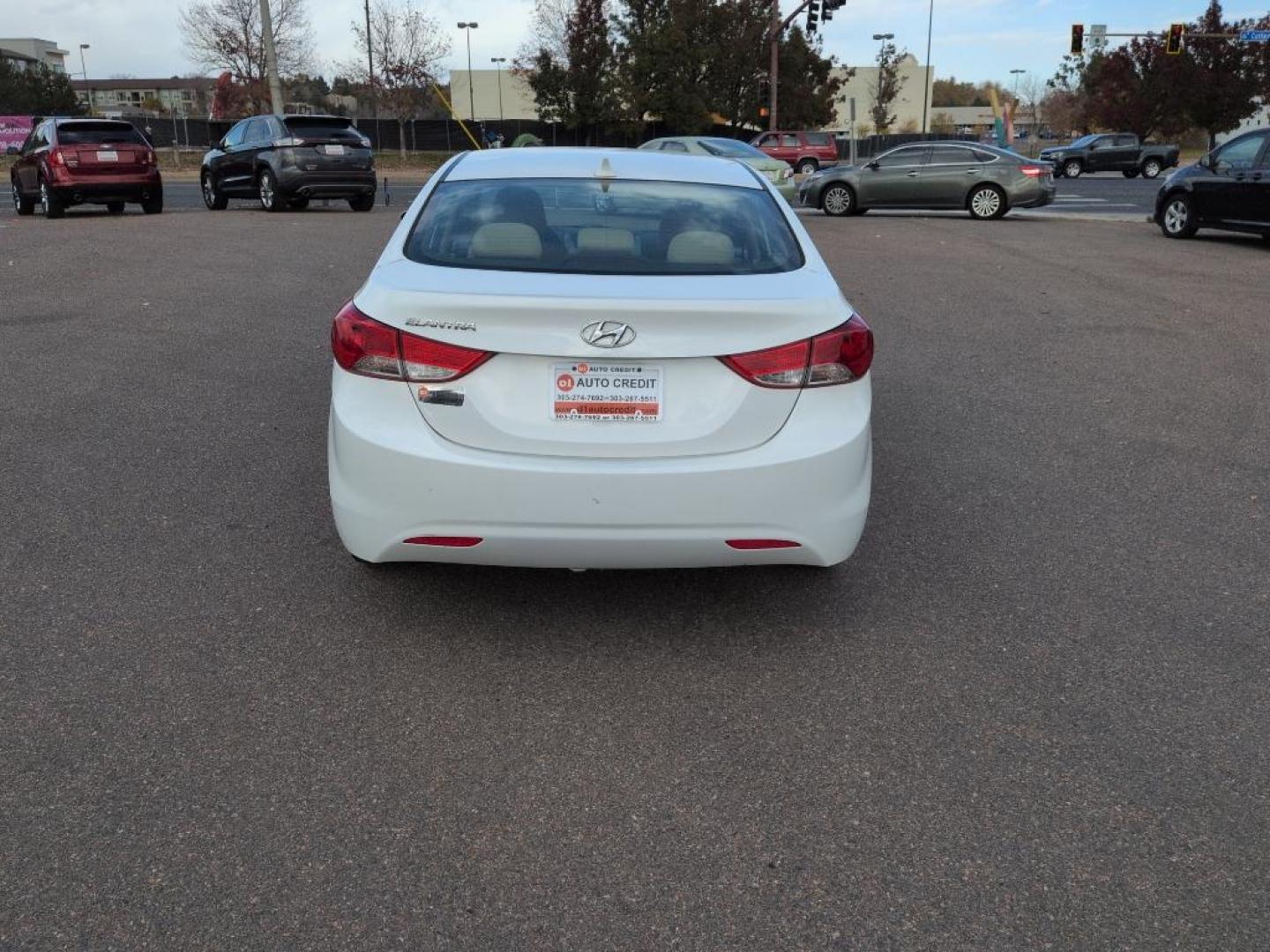 2012 WHITE Hyundai Elantra LIMITED (5NPDH4AEXCH) with an 4 Cyl, 1.8L engine, Automatic transmission, located at 10890 W. Colfax Ave., Lakewood, CO, 80215, (303) 274-7692, 39.739914, -105.120132 - Photo#5