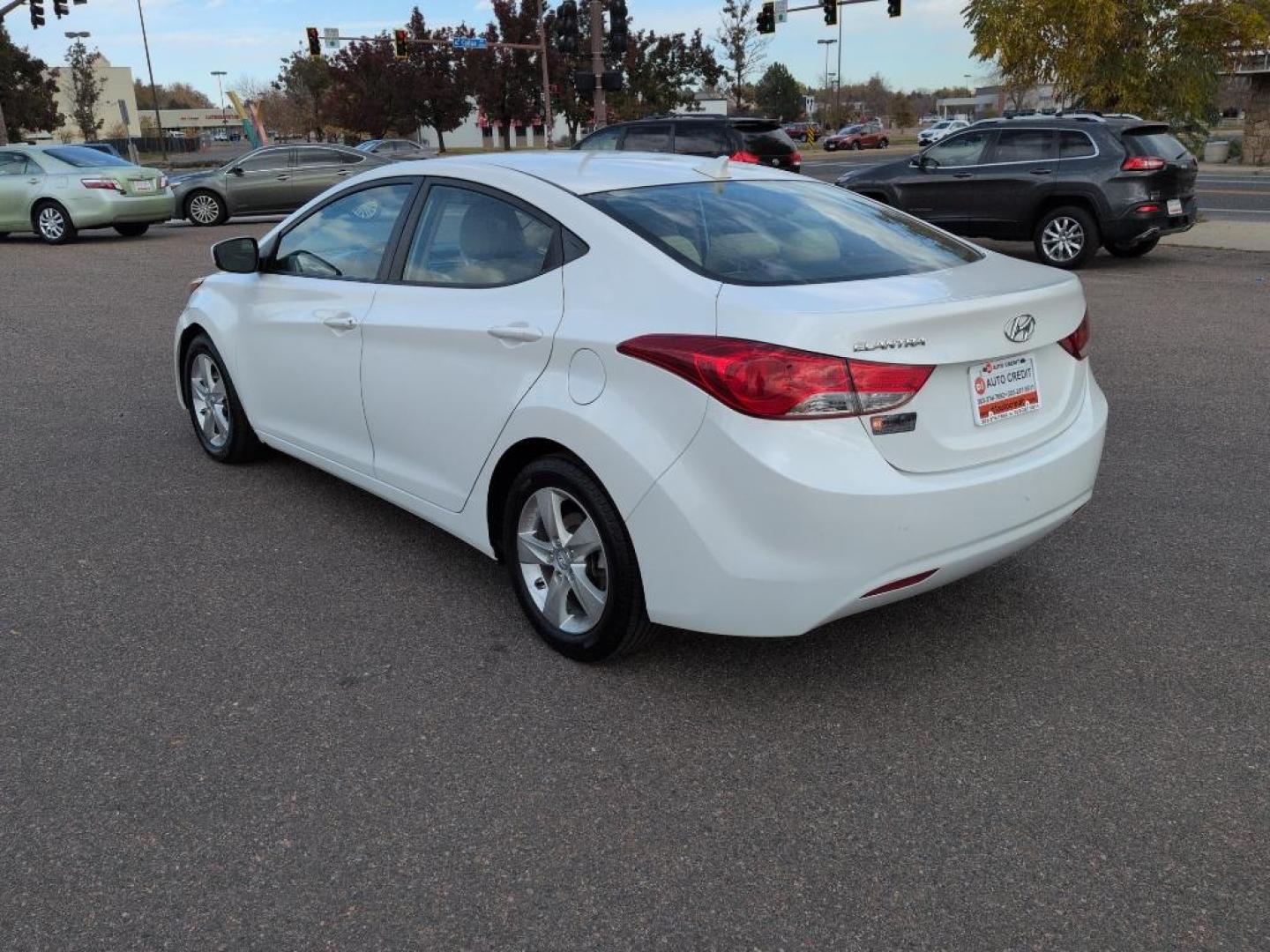 2012 WHITE Hyundai Elantra LIMITED (5NPDH4AEXCH) with an 4 Cyl, 1.8L engine, Automatic transmission, located at 10890 W. Colfax Ave., Lakewood, CO, 80215, (303) 274-7692, 39.739914, -105.120132 - Photo#6
