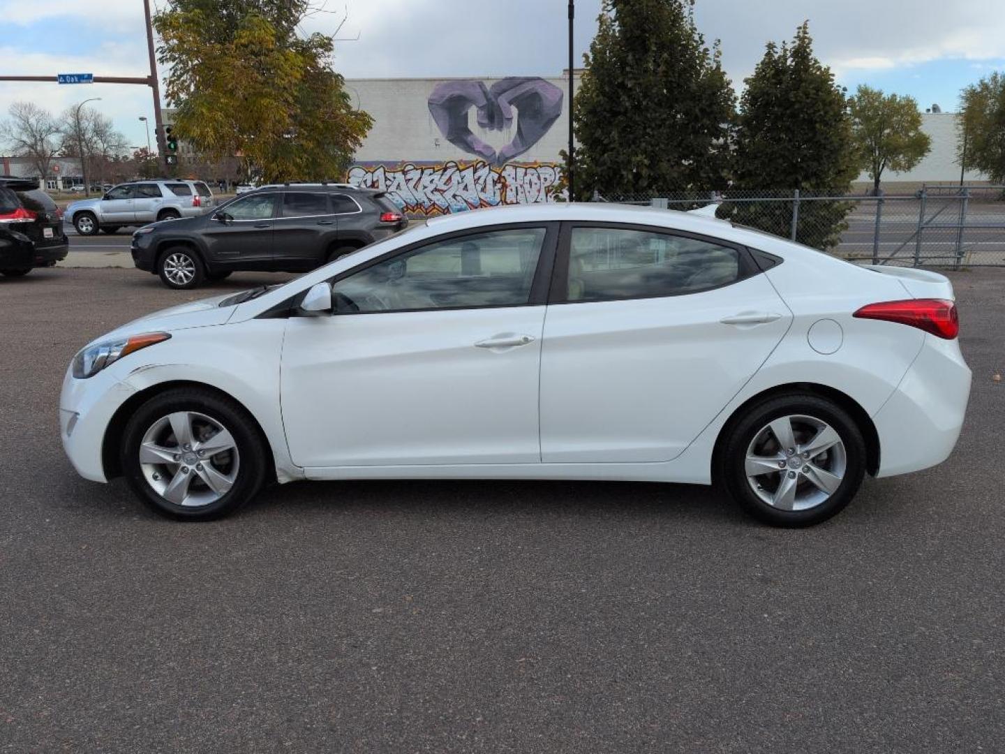 2012 WHITE Hyundai Elantra LIMITED (5NPDH4AEXCH) with an 4 Cyl, 1.8L engine, Automatic transmission, located at 10890 W. Colfax Ave., Lakewood, CO, 80215, (303) 274-7692, 39.739914, -105.120132 - Photo#7