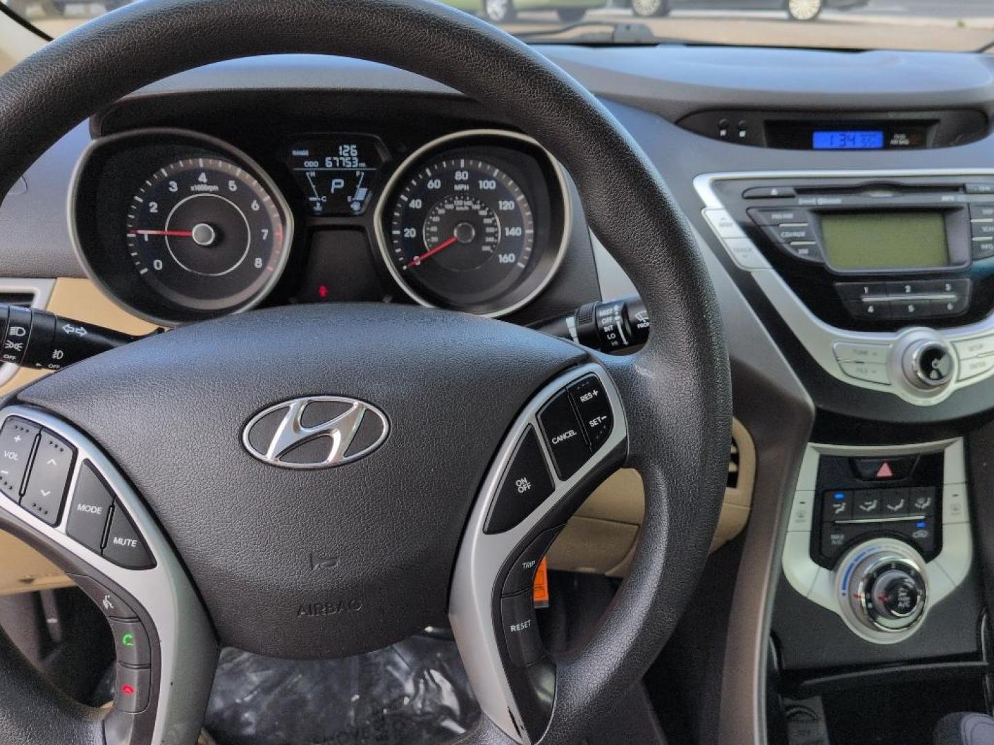 2012 WHITE Hyundai Elantra LIMITED (5NPDH4AEXCH) with an 4 Cyl, 1.8L engine, Automatic transmission, located at 10890 W. Colfax Ave., Lakewood, CO, 80215, (303) 274-7692, 39.739914, -105.120132 - Photo#10