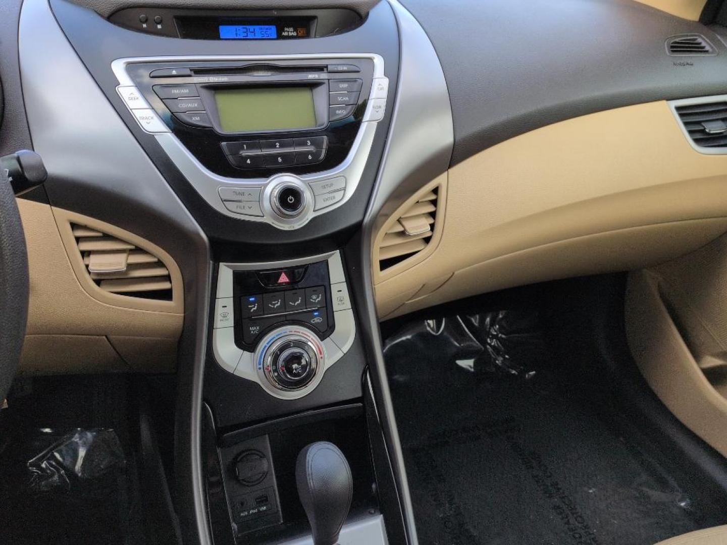 2012 WHITE Hyundai Elantra LIMITED (5NPDH4AEXCH) with an 4 Cyl, 1.8L engine, Automatic transmission, located at 10890 W. Colfax Ave., Lakewood, CO, 80215, (303) 274-7692, 39.739914, -105.120132 - Photo#12