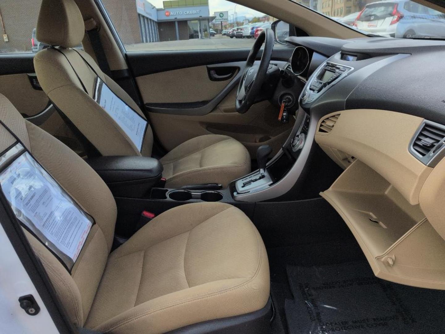 2012 WHITE Hyundai Elantra LIMITED (5NPDH4AEXCH) with an 4 Cyl, 1.8L engine, Automatic transmission, located at 10890 W. Colfax Ave., Lakewood, CO, 80215, (303) 274-7692, 39.739914, -105.120132 - Photo#17
