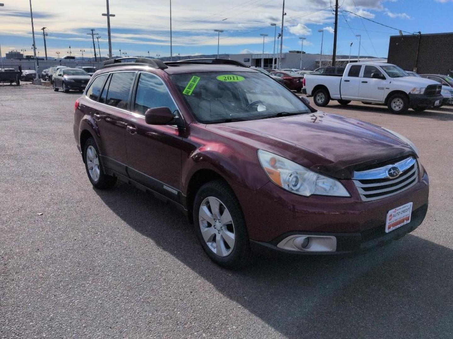 2011 RED Subaru Outback 2.5i Premium (4S4BRCGC0B3) with an 4 Cyl, 2.5L engine, Automatic transmission, located at 10890 W. Colfax Ave., Lakewood, CO, 80215, (303) 274-7692, 39.739914, -105.120132 - Photo#2