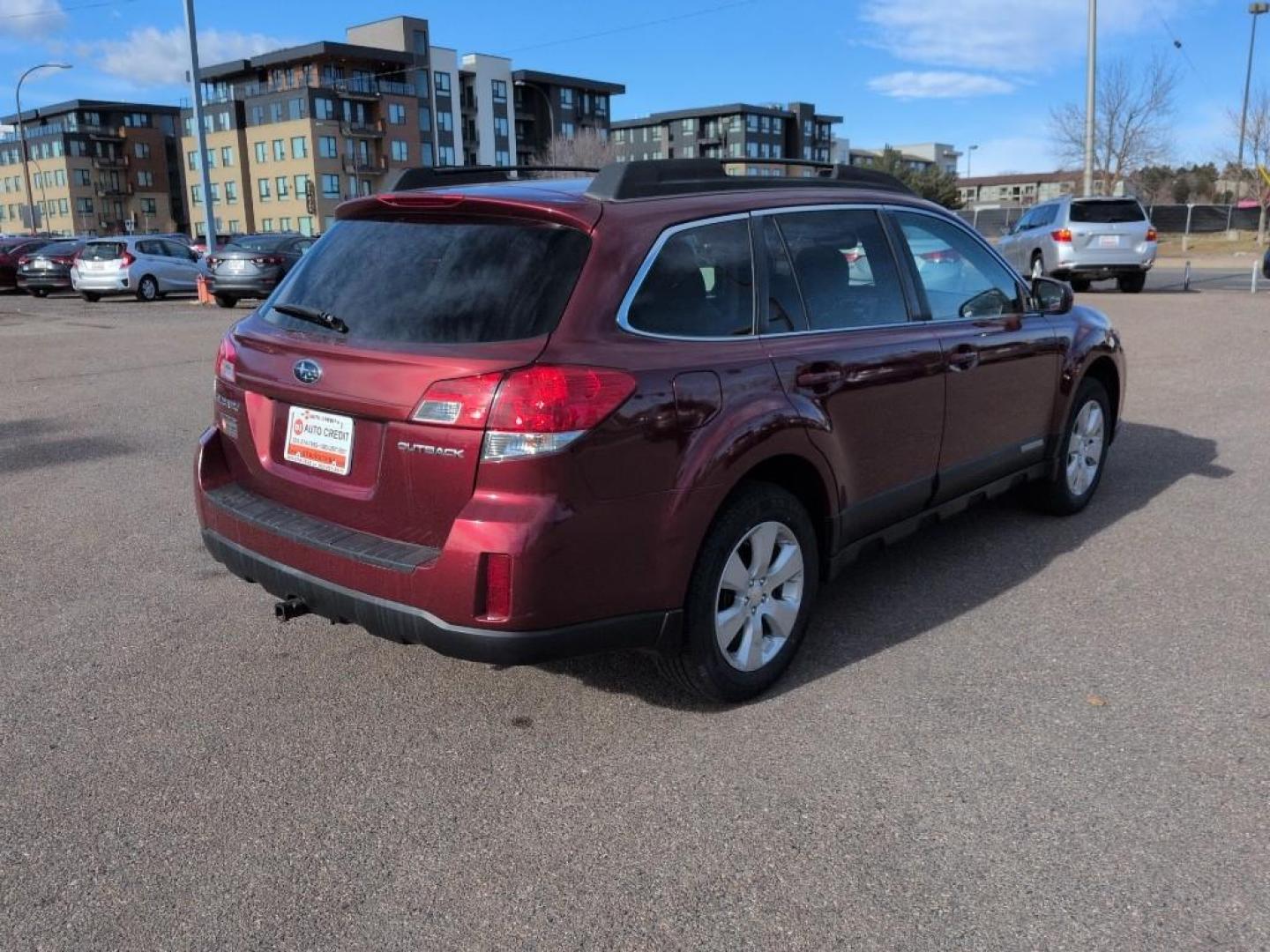 2011 RED Subaru Outback 2.5i Premium (4S4BRCGC0B3) with an 4 Cyl, 2.5L engine, Automatic transmission, located at 10890 W. Colfax Ave., Lakewood, CO, 80215, (303) 274-7692, 39.739914, -105.120132 - Photo#4