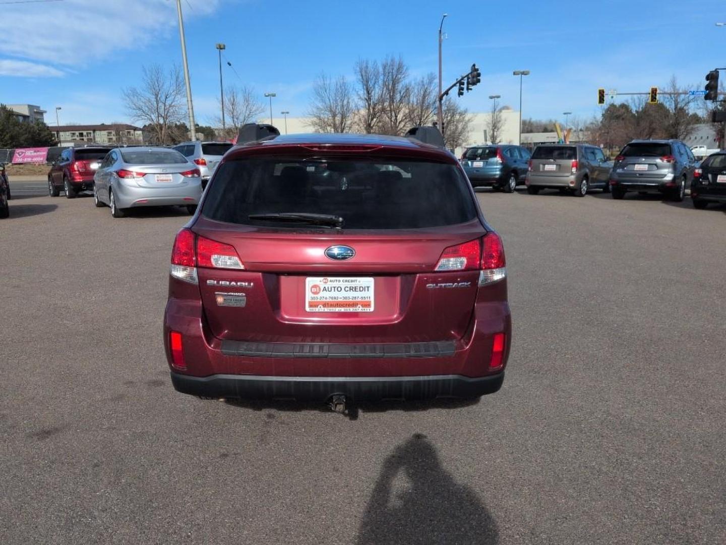 2011 RED Subaru Outback 2.5i Premium (4S4BRCGC0B3) with an 4 Cyl, 2.5L engine, Automatic transmission, located at 10890 W. Colfax Ave., Lakewood, CO, 80215, (303) 274-7692, 39.739914, -105.120132 - Photo#5
