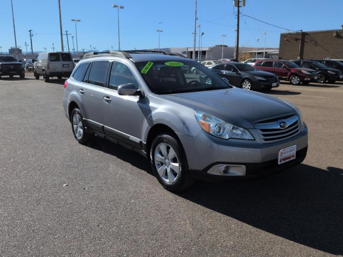 2010 SILVER Subaru Outback 2.5i Premium (4S4BRCCC9A3) with an 4 Cyl, 2.5L engine, Automatic transmission, located at 10890 W. Colfax Ave., Lakewood, CO, 80215, (303) 274-7692, 39.739914, -105.120132 - Photo#2