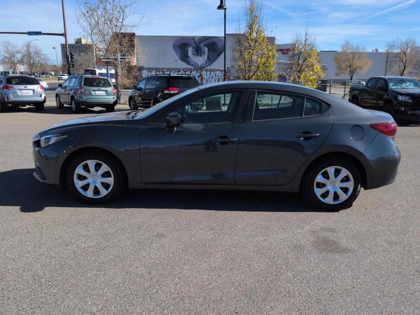 2015 GRAY Mazda Mazda3 i Sport w/SKYACTIV-G (3MZBM1U79FM) with an 4 Cyl, 2.0L engine, Automatic transmission, located at 10890 W. Colfax Ave., Lakewood, CO, 80215, (303) 274-7692, 39.739914, -105.120132 - Photo#7