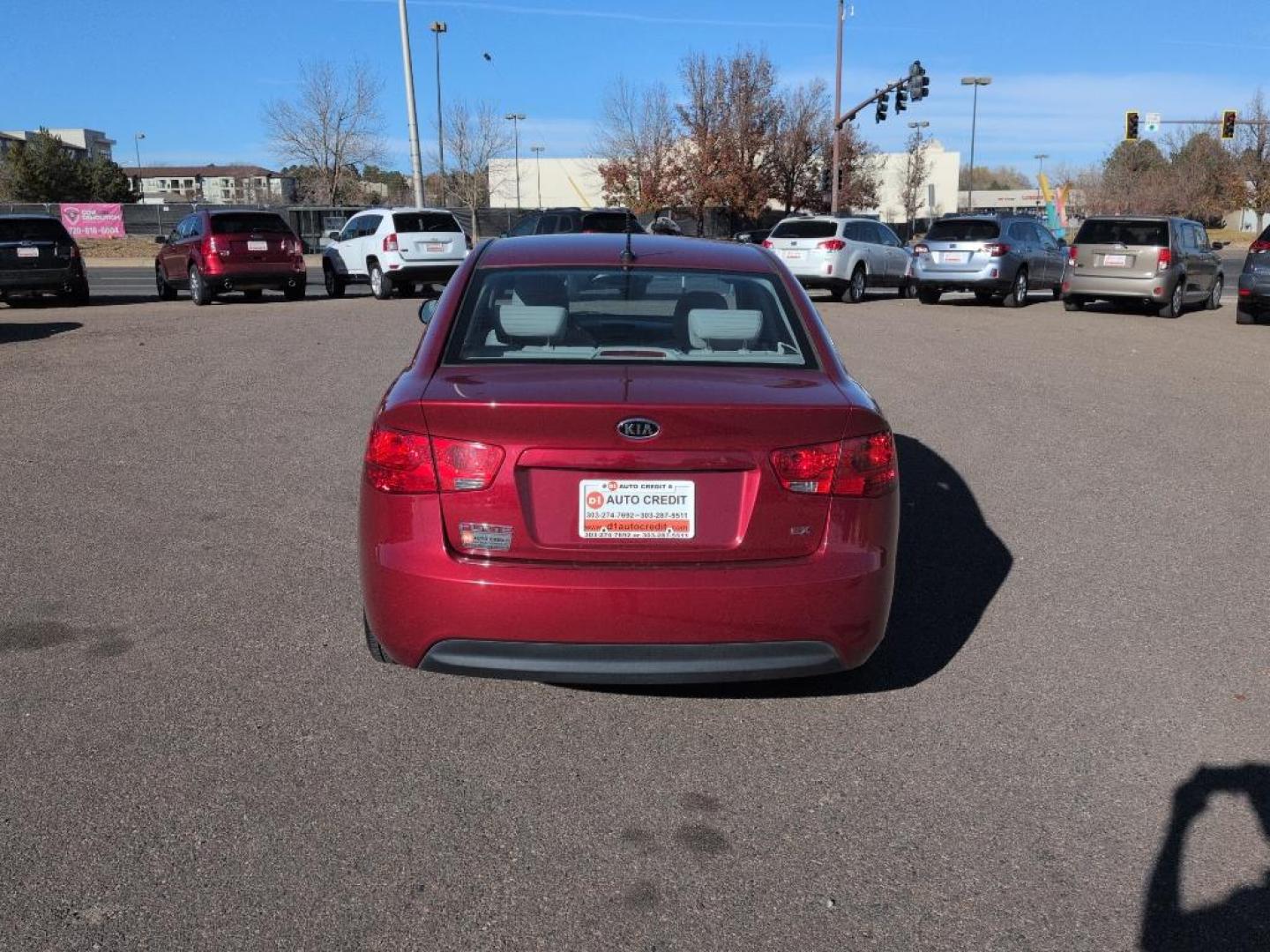 2010 RED Kia Forte EX (KNAFU4A23A5) with an 4 Cyl, 2.0L engine, Automatic transmission, located at 10890 W. Colfax Ave., Lakewood, CO, 80215, (303) 274-7692, 39.739914, -105.120132 - Photo#5