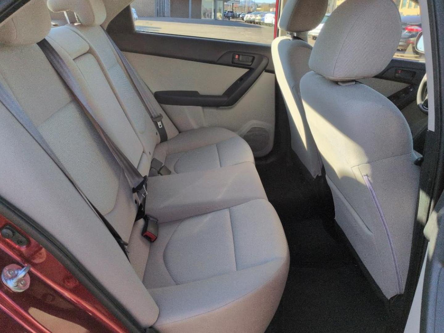 2010 RED Kia Forte EX (KNAFU4A23A5) with an 4 Cyl, 2.0L engine, Automatic transmission, located at 10890 W. Colfax Ave., Lakewood, CO, 80215, (303) 274-7692, 39.739914, -105.120132 - Photo#19