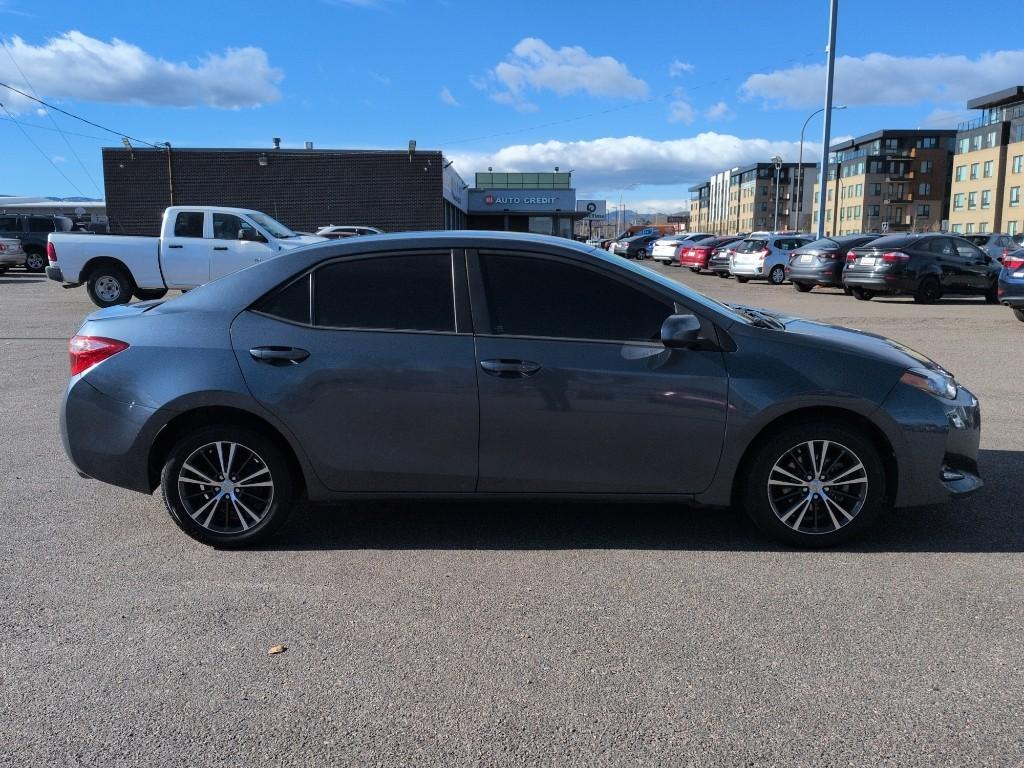 2017 GRAY Toyota Corolla L CVT (5YFBURHEXHP) with an 4 Cyl, 1.8L engine, Automatic transmission, located at 10890 W. Colfax Ave., Lakewood, CO, 80215, (303) 274-7692, 39.739914, -105.120132 - Photo#3