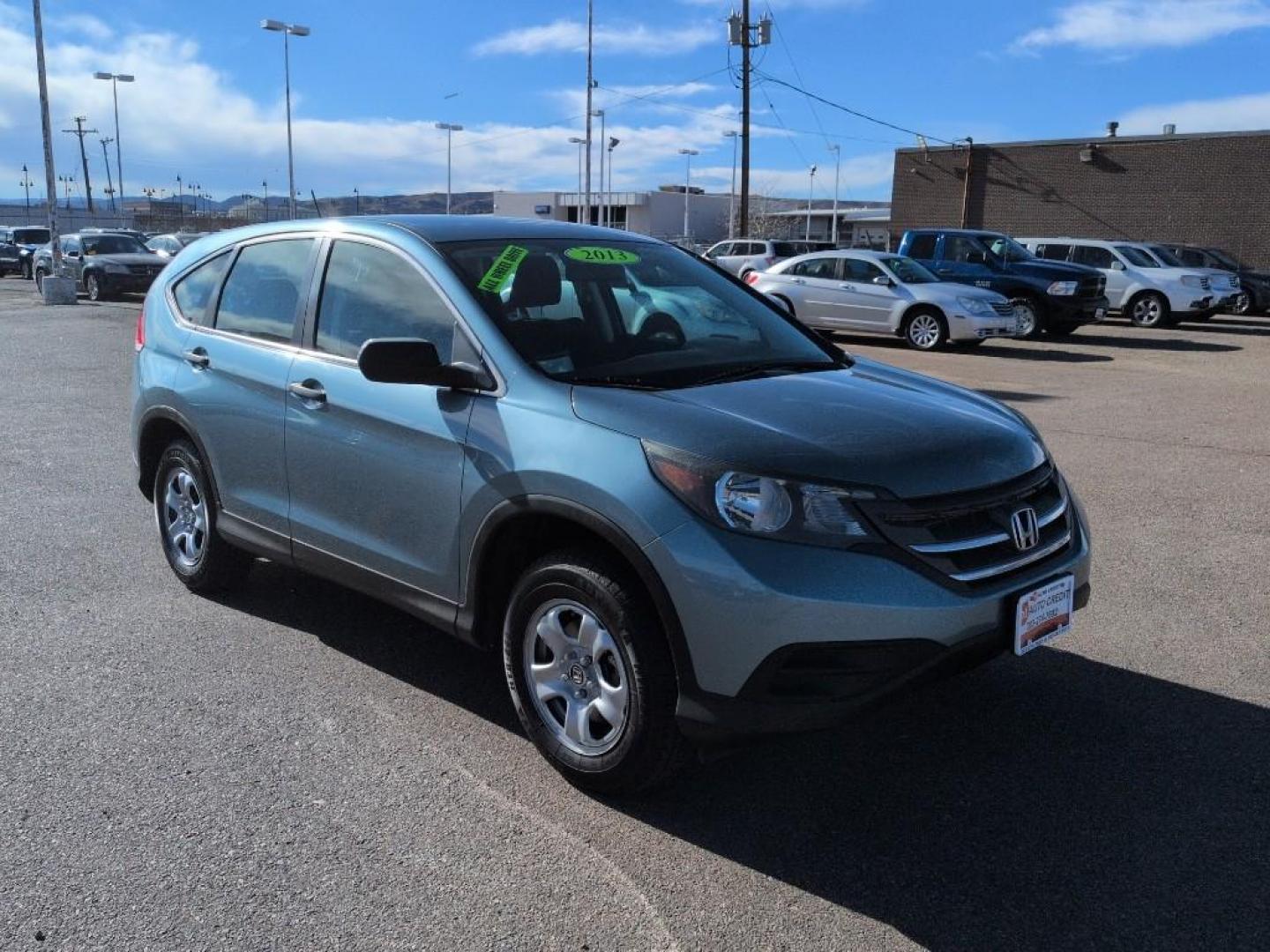 2013 GRAY Honda CR-V LX (5J6RM4H31DL) with an 4 Cyl, 2.4L engine, Automatic transmission, located at 10890 W. Colfax Ave., Lakewood, CO, 80215, (303) 274-7692, 39.739914, -105.120132 - Photo#2