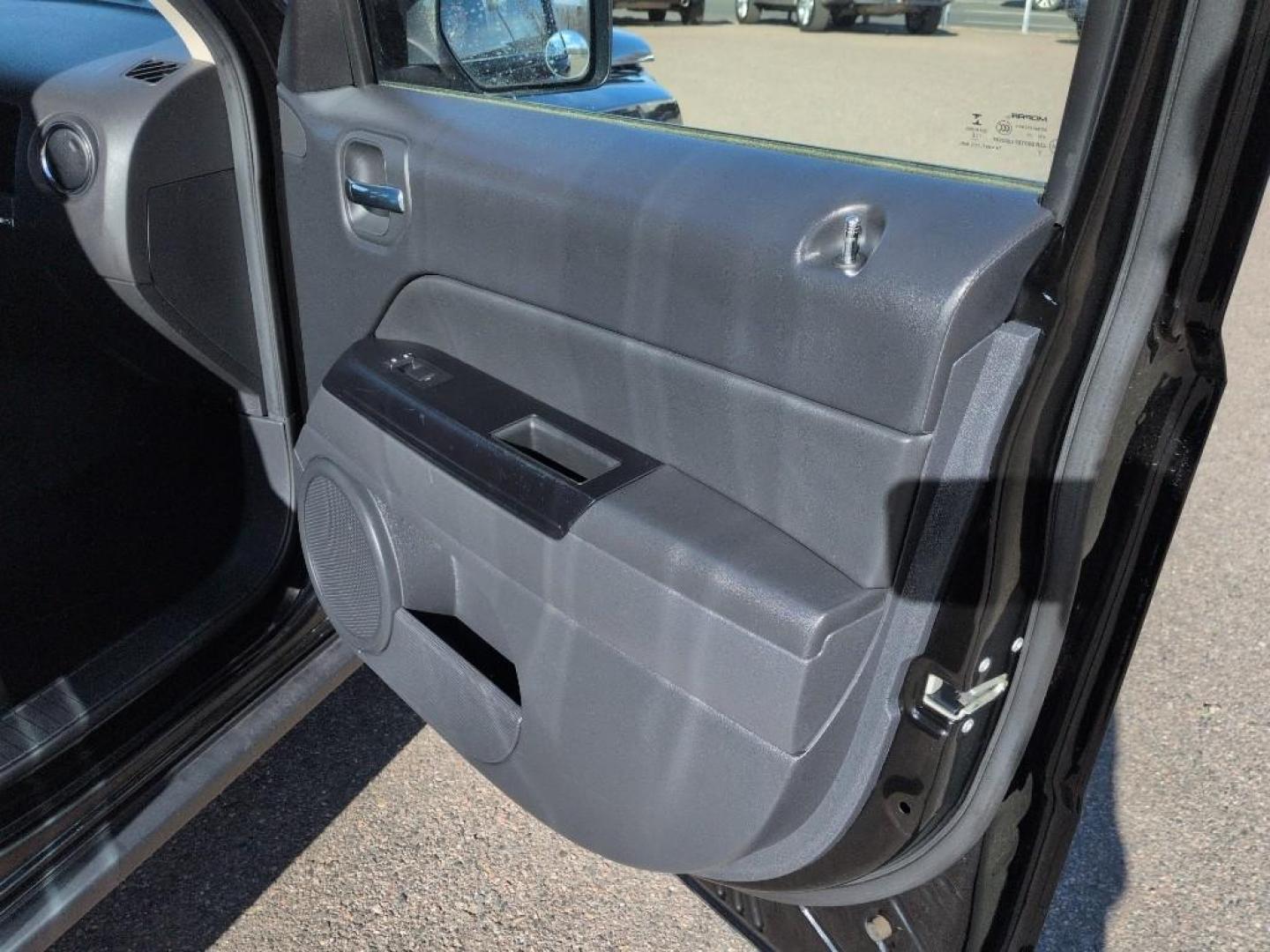 2016 BLACK Jeep Patriot Latitude (1C4NJPFB3GD) with an 4 Cyl, 2.4L engine, Automatic transmission, located at 10890 W. Colfax Ave., Lakewood, CO, 80215, (303) 274-7692, 39.739914, -105.120132 - Photo#16