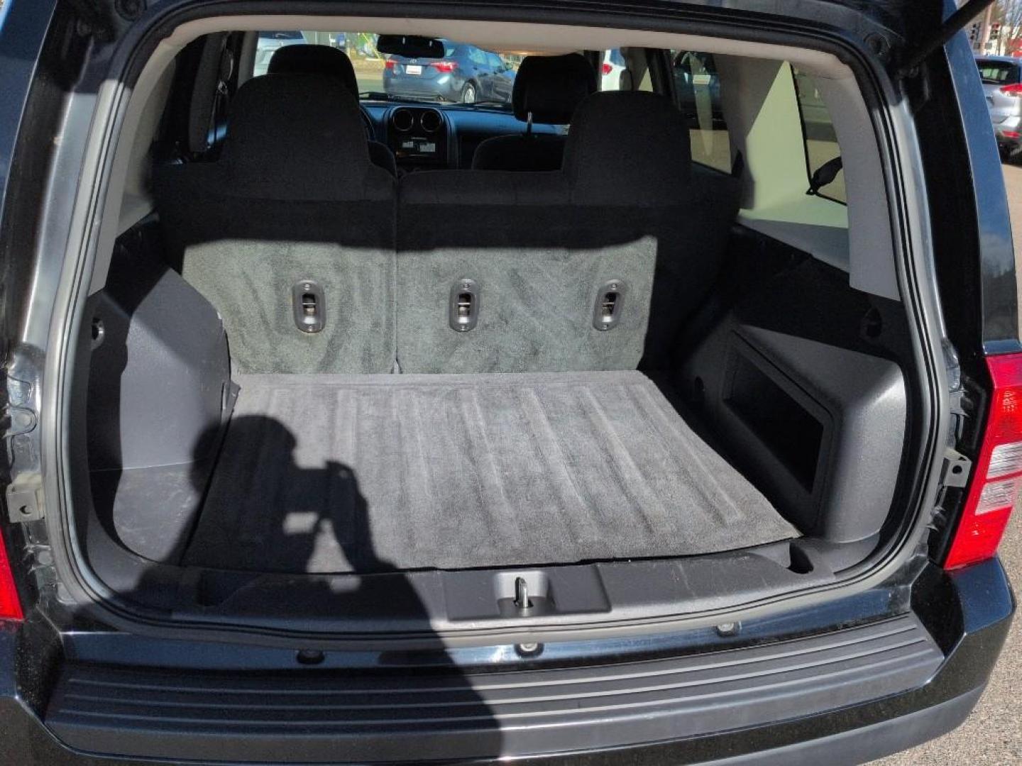 2016 BLACK Jeep Patriot Latitude (1C4NJPFB3GD) with an 4 Cyl, 2.4L engine, Automatic transmission, located at 10890 W. Colfax Ave., Lakewood, CO, 80215, (303) 274-7692, 39.739914, -105.120132 - Photo#20