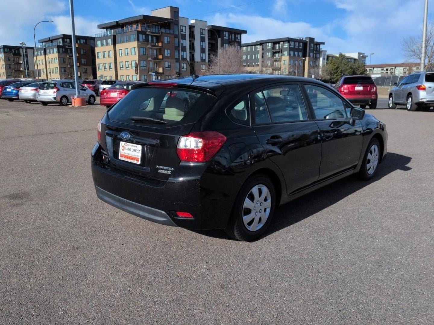 2015 BLACK Subaru Impreza Base (JF1GPAA68FH) with an 4 Cyl, 2.0L engine, Automatic transmission, located at 10890 W. Colfax Ave., Lakewood, CO, 80215, (303) 274-7692, 39.739914, -105.120132 - Photo#4