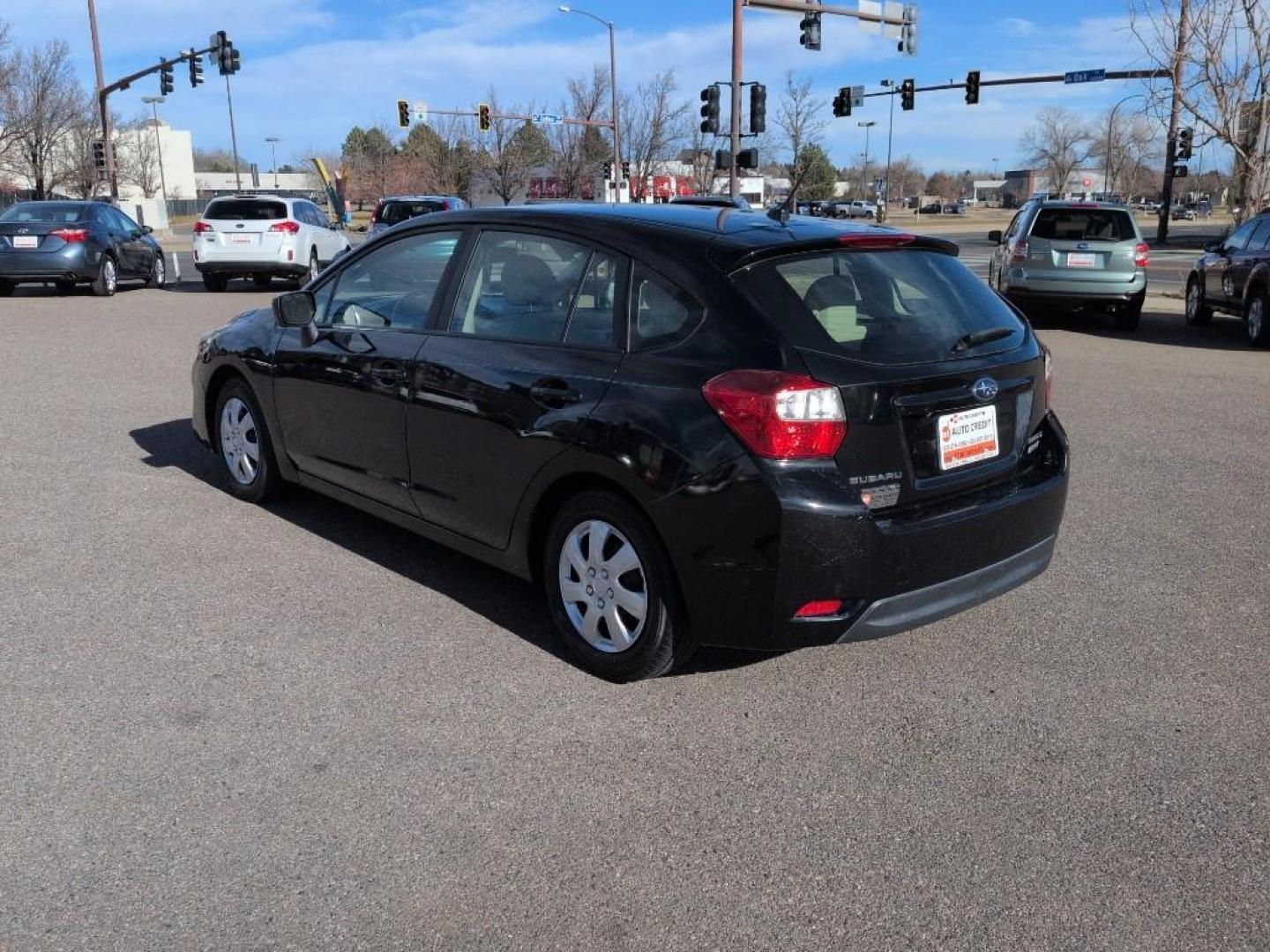 2015 BLACK Subaru Impreza Base (JF1GPAA68FH) with an 4 Cyl, 2.0L engine, Automatic transmission, located at 10890 W. Colfax Ave., Lakewood, CO, 80215, (303) 274-7692, 39.739914, -105.120132 - Photo#6