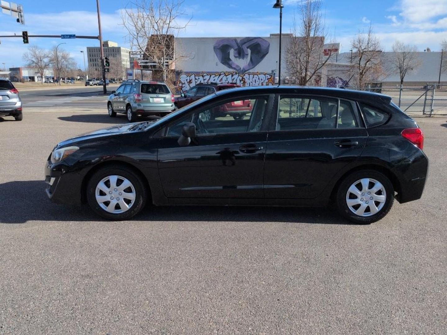 2015 BLACK Subaru Impreza Base (JF1GPAA68FH) with an 4 Cyl, 2.0L engine, Automatic transmission, located at 10890 W. Colfax Ave., Lakewood, CO, 80215, (303) 274-7692, 39.739914, -105.120132 - Photo#7