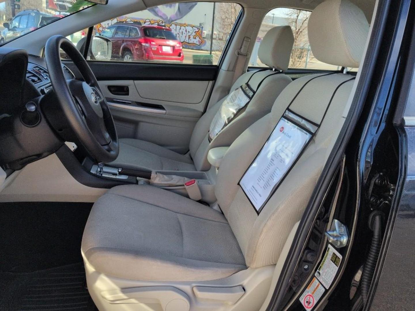 2015 BLACK Subaru Impreza Base (JF1GPAA68FH) with an 4 Cyl, 2.0L engine, Automatic transmission, located at 10890 W. Colfax Ave., Lakewood, CO, 80215, (303) 274-7692, 39.739914, -105.120132 - Photo#9