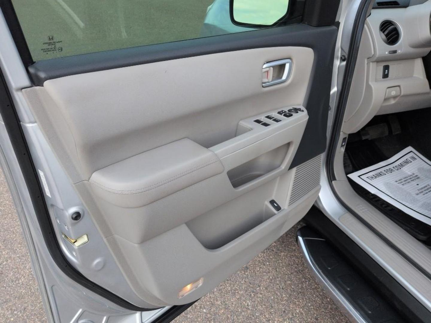 2012 GRAY Honda Pilot EXL (5FNYF4H53CB) with an V6, 3.5L engine, Automatic transmission, located at 10890 W. Colfax Ave., Lakewood, CO, 80215, (303) 274-7692, 39.739914, -105.120132 - Photo#8