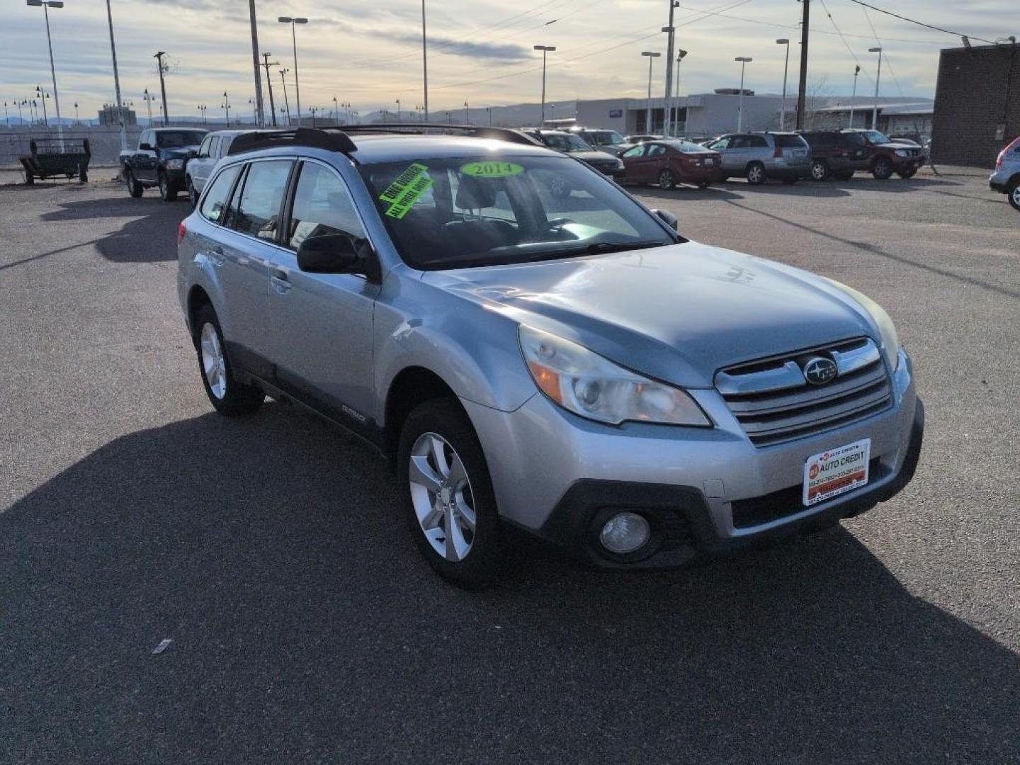 2014 SILVER Subaru Outback 2.5i (4S4BRCAC4E3) with an 4 Cyl, 2.5L engine, Automatic transmission, located at 10890 W. Colfax Ave., Lakewood, CO, 80215, (303) 274-7692, 39.739914, -105.120132 - Photo#2