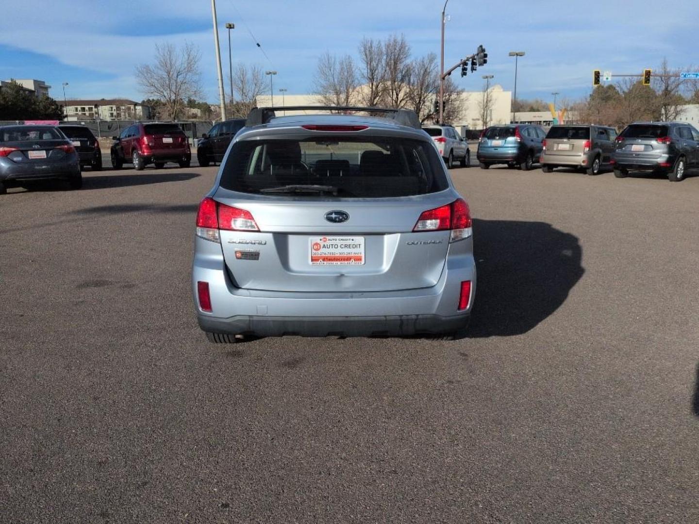 2014 SILVER Subaru Outback 2.5i (4S4BRCAC4E3) with an 4 Cyl, 2.5L engine, Automatic transmission, located at 10890 W. Colfax Ave., Lakewood, CO, 80215, (303) 274-7692, 39.739914, -105.120132 - Photo#5