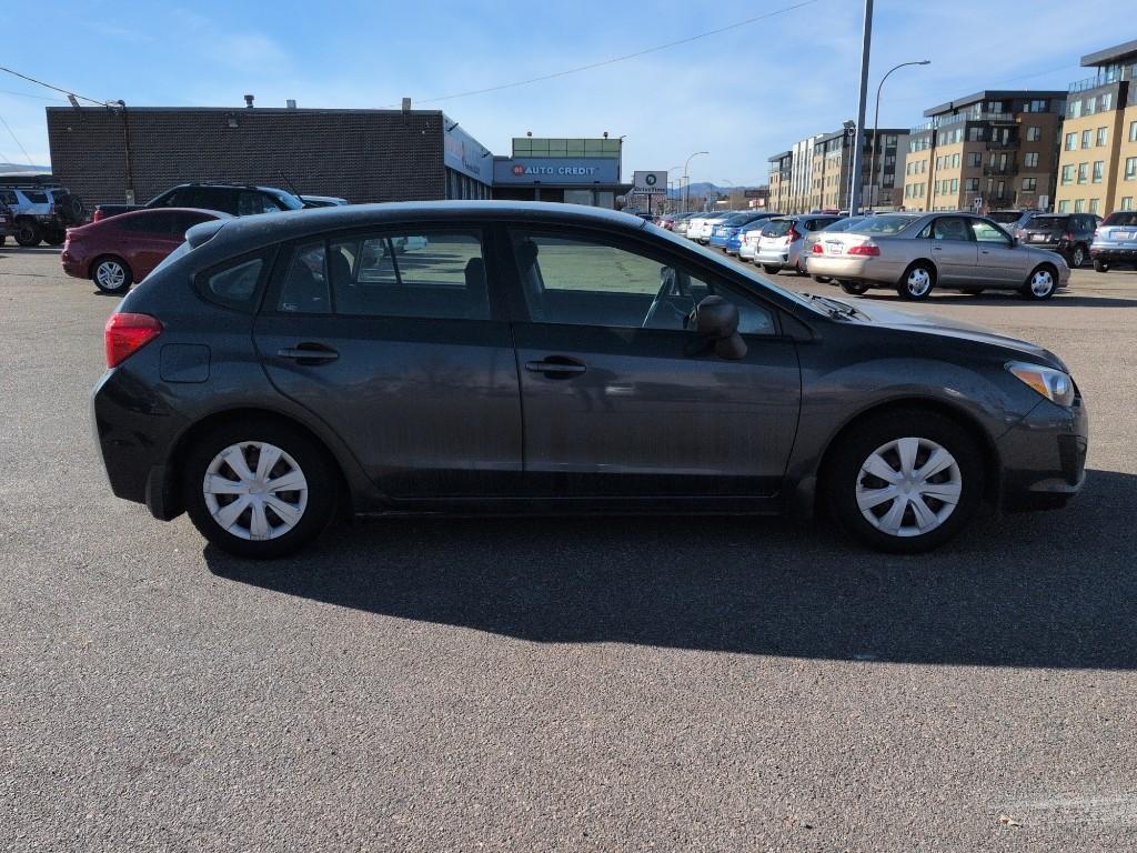 2013 GRAY Subaru Impreza Base (JF1GPAA61DH) with an 4 Cyl, 2.0L engine, Automatic transmission, located at 10890 W. Colfax Ave., Lakewood, CO, 80215, (303) 274-7692, 39.739914, -105.120132 - Photo#3