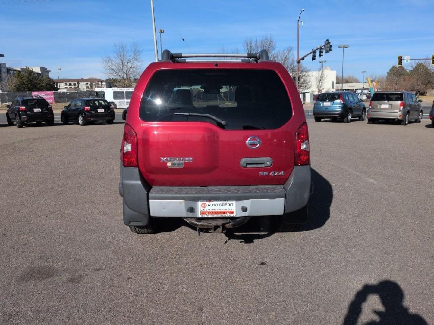 2010 RED Nissan Xterra X 4WD (5N1AN0NW4AC) with an V6, 4.0L engine, Automatic transmission, located at 10890 W. Colfax Ave., Lakewood, CO, 80215, (303) 274-7692, 39.739914, -105.120132 - Photo#5
