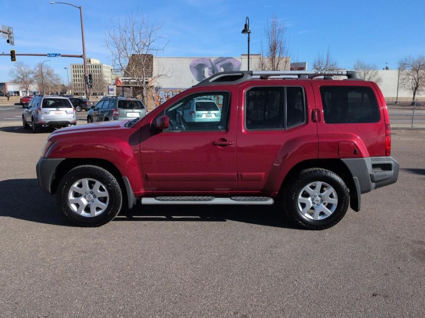 2010 RED Nissan Xterra X 4WD (5N1AN0NW4AC) with an V6, 4.0L engine, Automatic transmission, located at 10890 W. Colfax Ave., Lakewood, CO, 80215, (303) 274-7692, 39.739914, -105.120132 - Photo#7