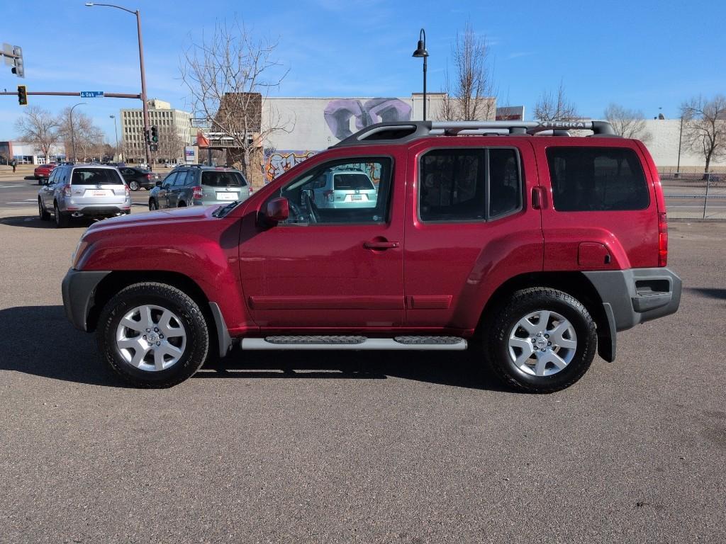 2010 RED Nissan Xterra X 4WD (5N1AN0NW4AC) with an V6, 4.0L engine, Automatic transmission, located at 10890 W. Colfax Ave., Lakewood, CO, 80215, (303) 274-7692, 39.739914, -105.120132 - Photo#7