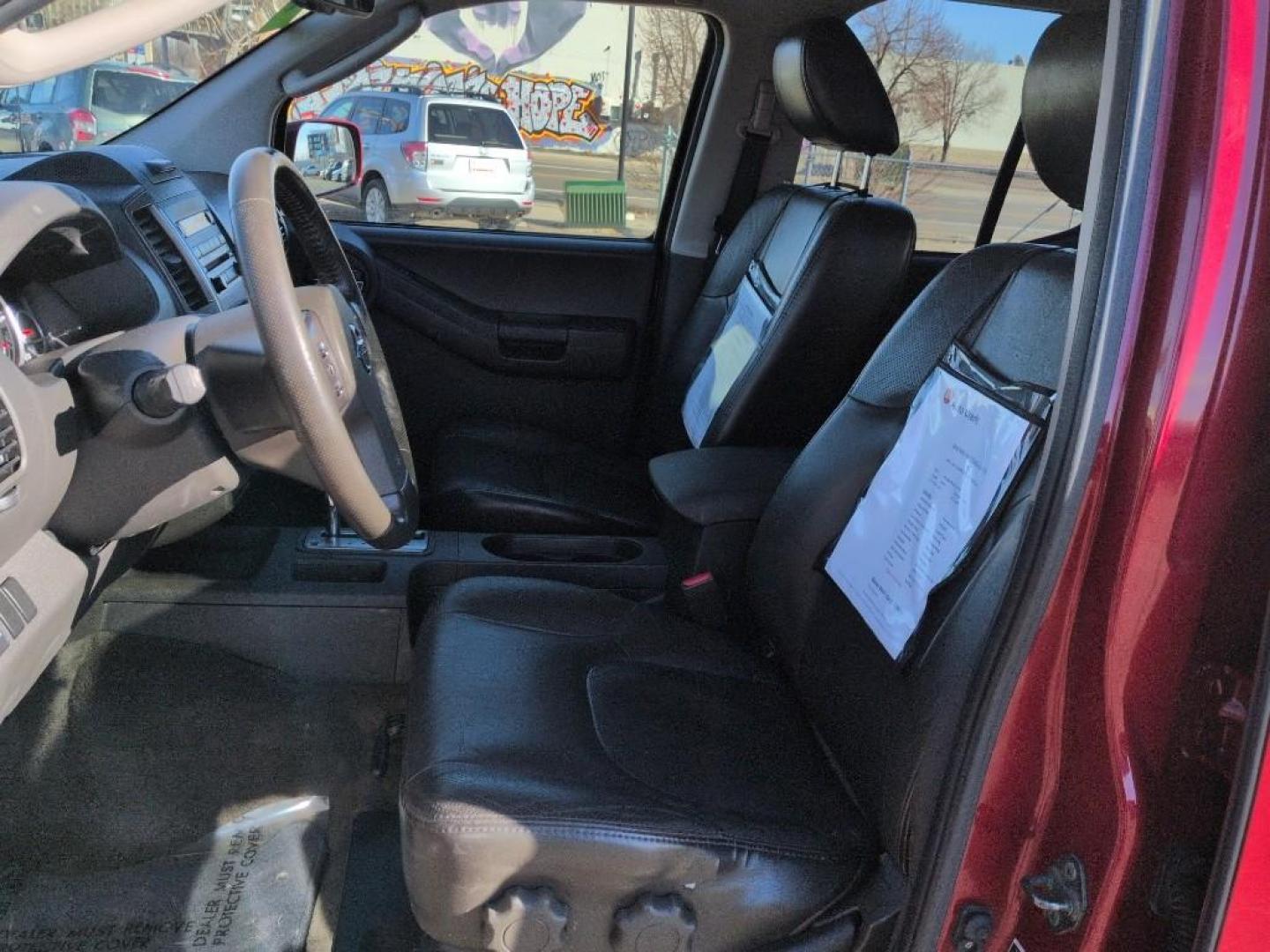 2010 RED Nissan Xterra X 4WD (5N1AN0NW4AC) with an V6, 4.0L engine, Automatic transmission, located at 10890 W. Colfax Ave., Lakewood, CO, 80215, (303) 274-7692, 39.739914, -105.120132 - Photo#9