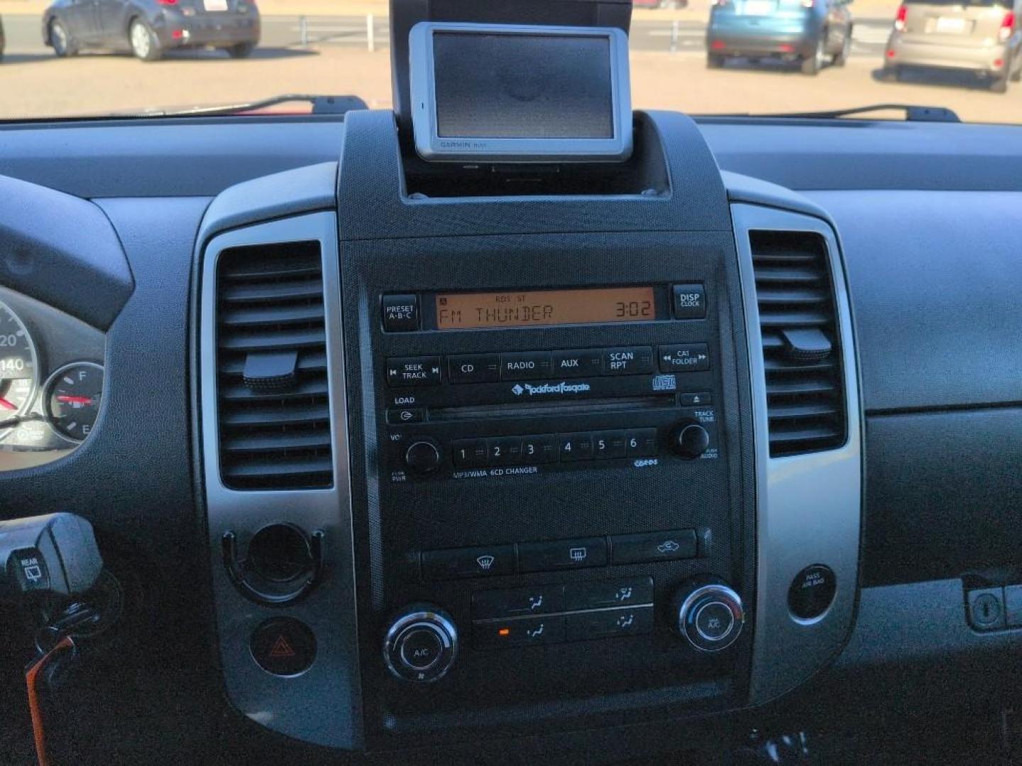 2010 RED Nissan Xterra X 4WD (5N1AN0NW4AC) with an V6, 4.0L engine, Automatic transmission, located at 10890 W. Colfax Ave., Lakewood, CO, 80215, (303) 274-7692, 39.739914, -105.120132 - Photo#13