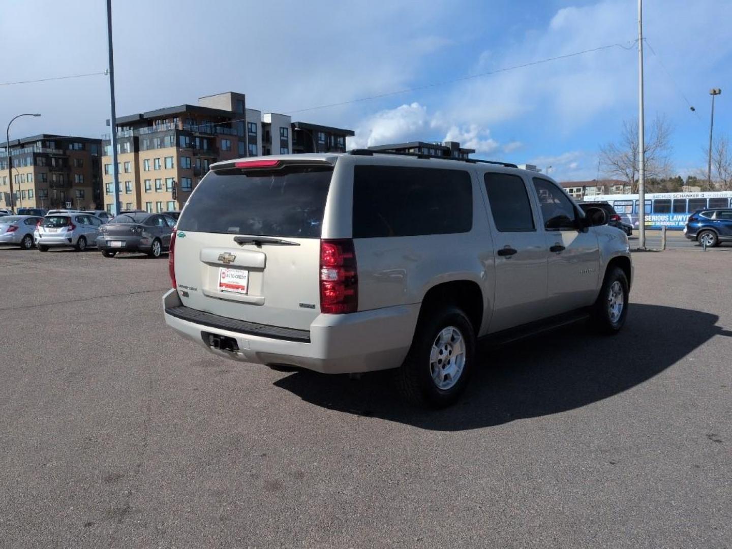 2010 GOLD Chevrolet Suburban LS (1GNUKHE34AR) with an V8, 5.3L engine, Automatic transmission, located at 10890 W. Colfax Ave., Lakewood, CO, 80215, (303) 274-7692, 39.739914, -105.120132 - Photo#4